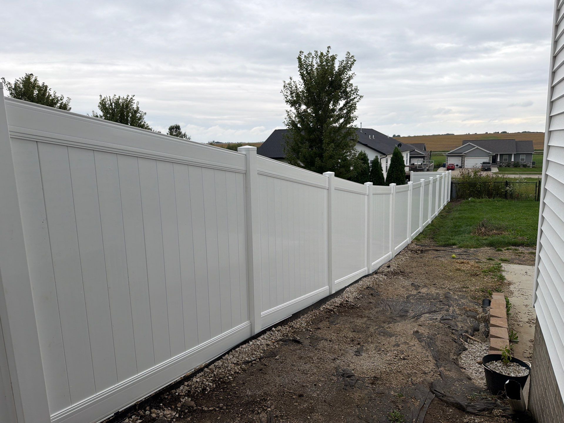 Residential Vinyl Privacy Fence Installation in Urbana by Perfect Picket Fence and Stain