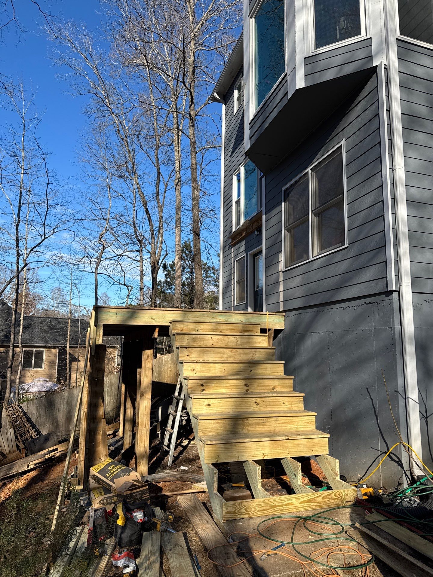 Two-Story Pressure-Treated Wood Deck Installation in Acworth, Georgia by Swift Home Renovations