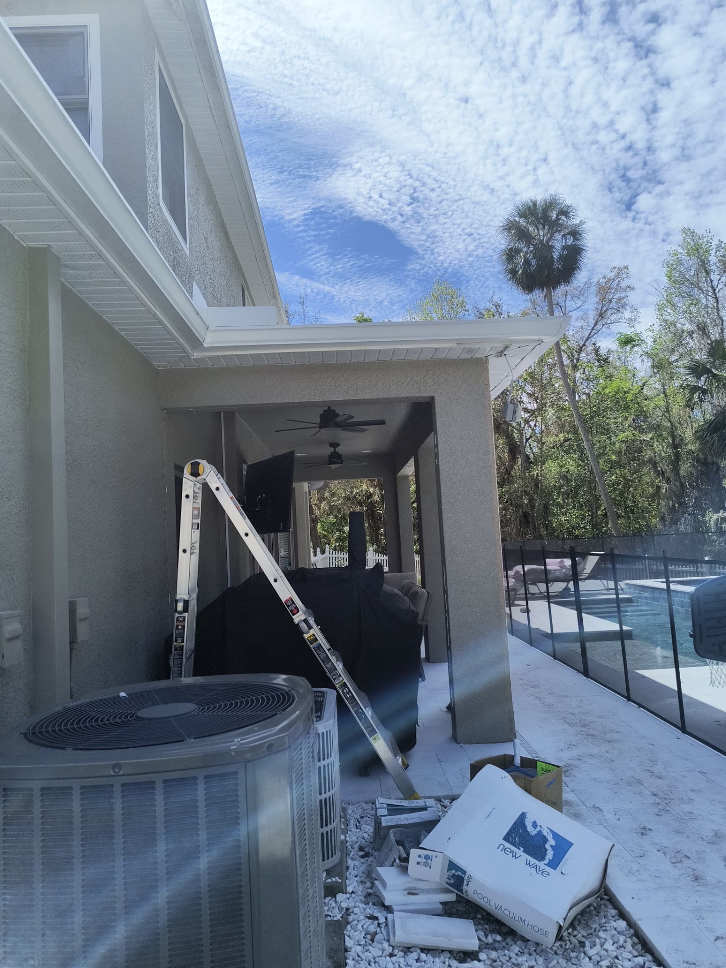 White 6'' Seamless K-style Gutters and Downspouts in Wesley Chapel, FL by Gutter Professors