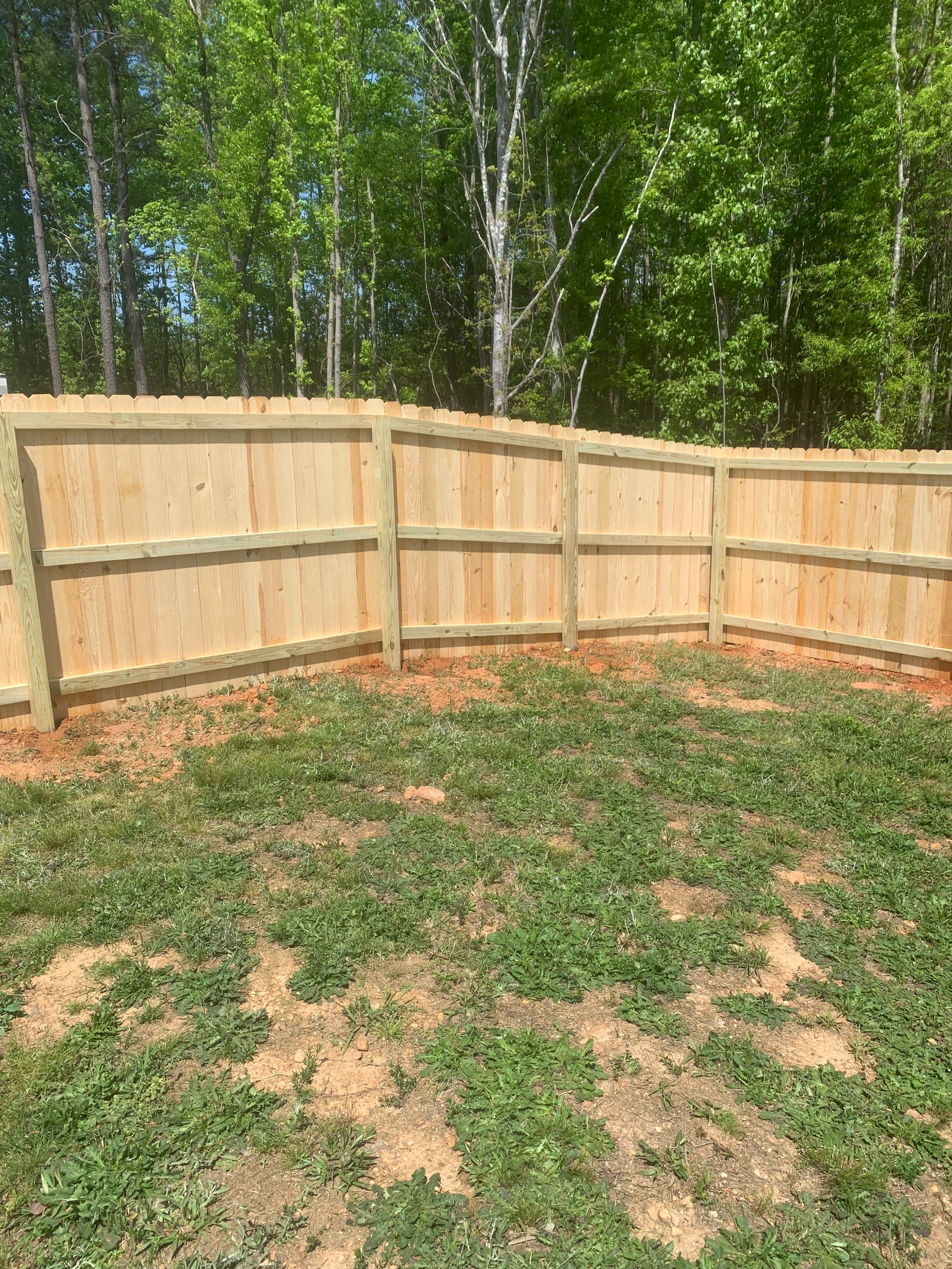 Stockade Wood Project in Roanoke Rapids by Superior Fence and Rail