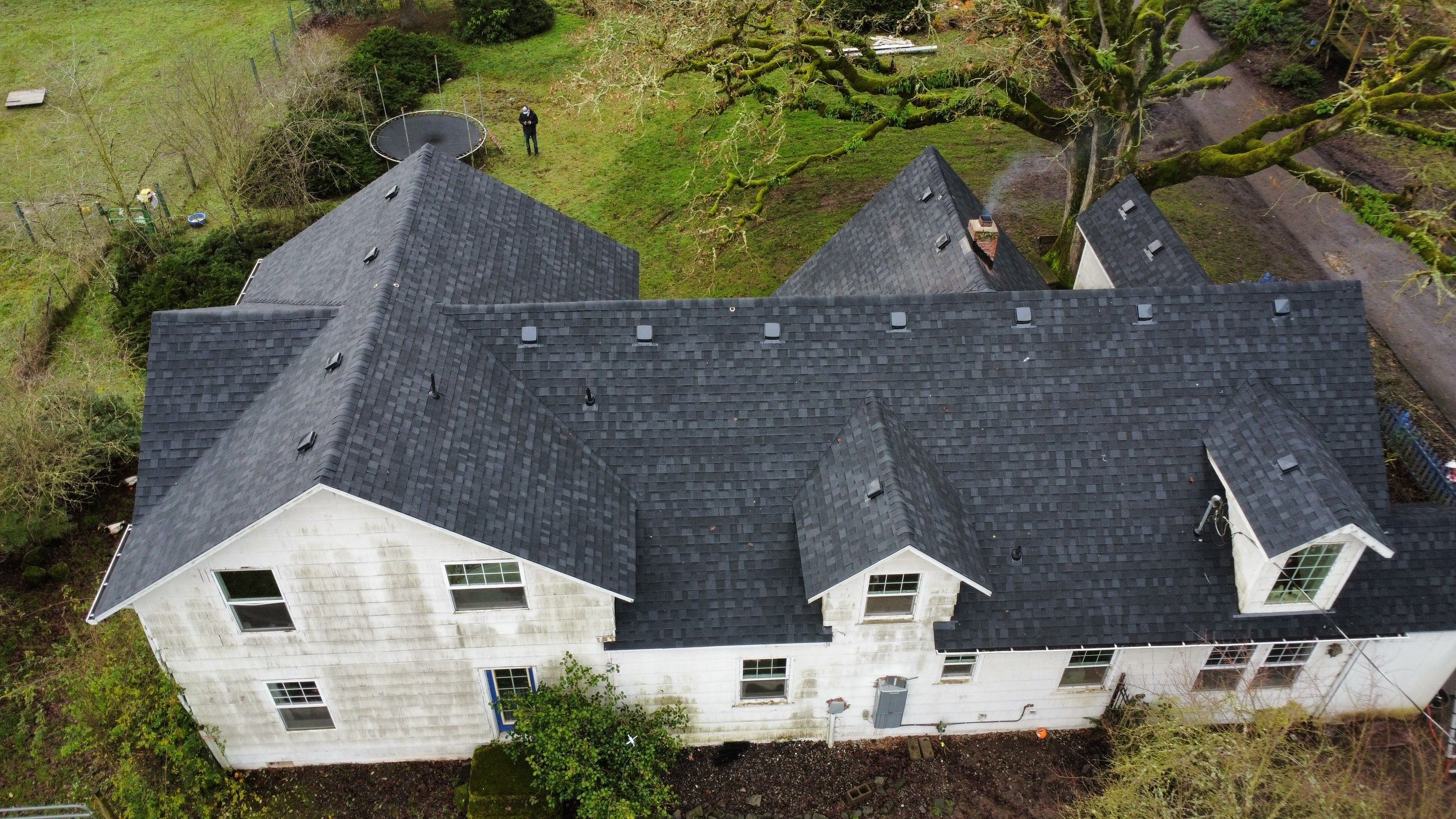 Residential Roofing Installation using IKO Dynasty (Color: Granite Black) by Orezona Building & Roofing Company, Inc.