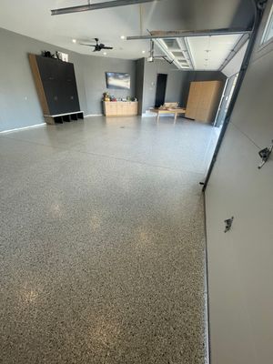 Custom Speckled Concrete Coating for Dell Rapids Garage