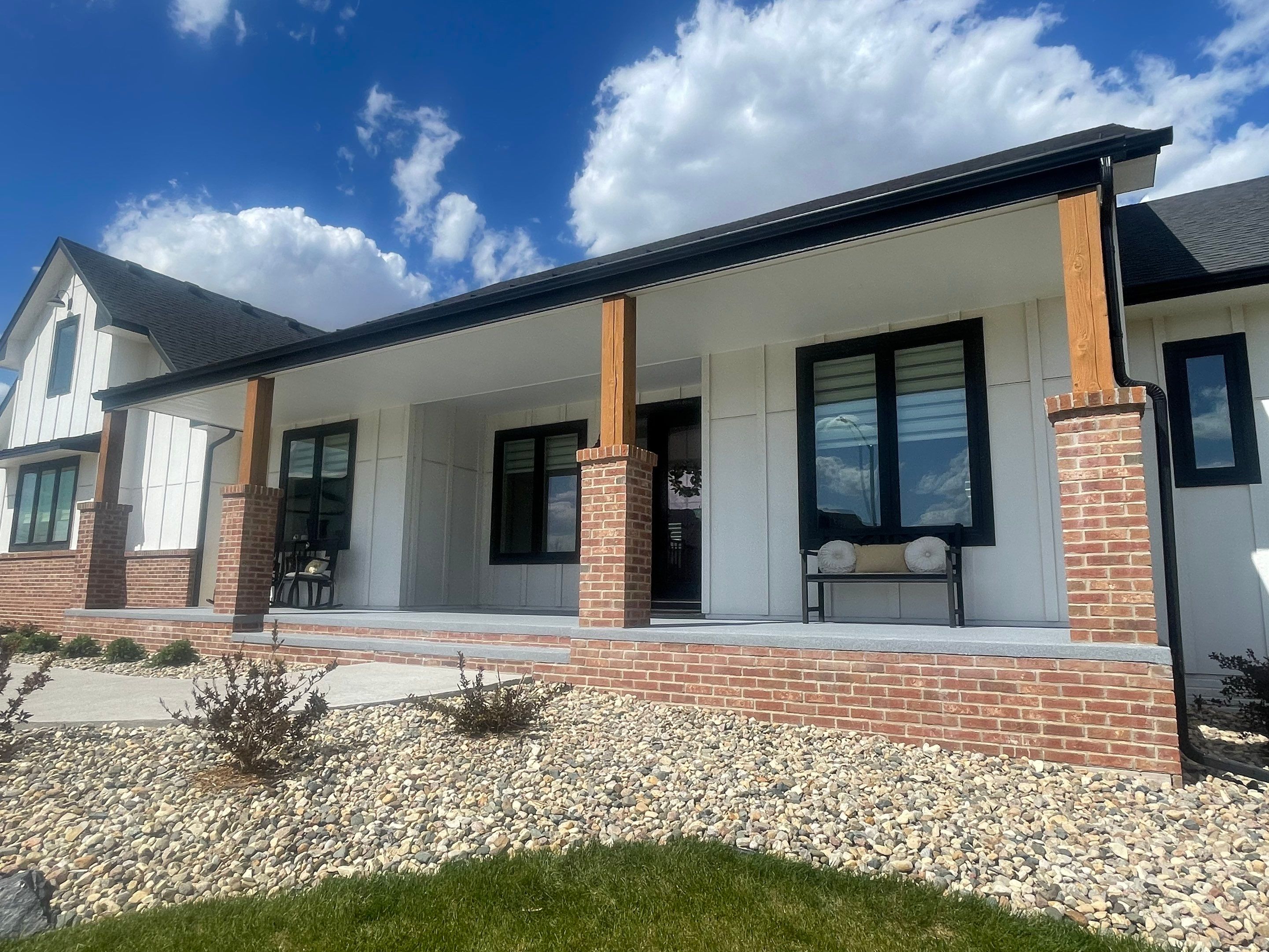 Grey Speckled Concrete Porch Coating for Sioux Falls Home by Select Painting, Coatings & Garage Cabinets