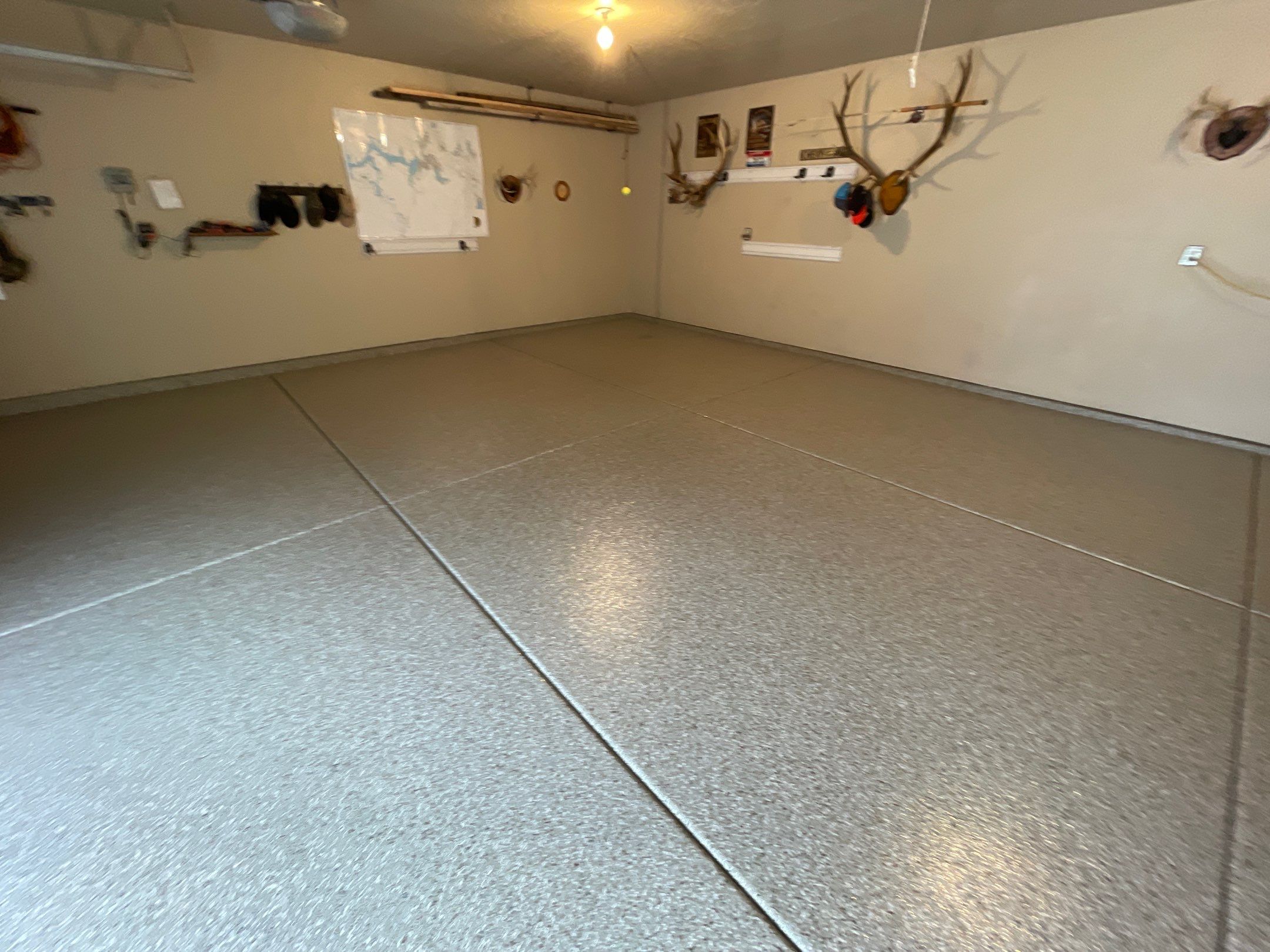 Garage Transformation using Pebble Beach and Front Porch using Greystone by Croc Coatings, LLC