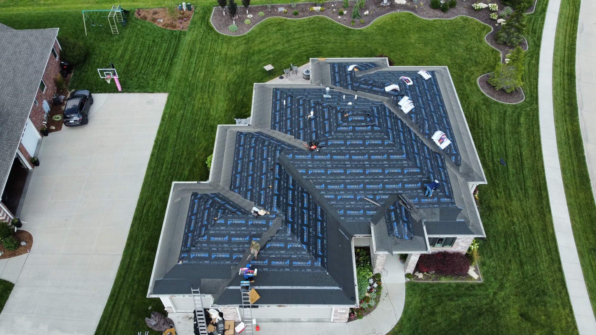 Residential Roofing Installation using TAMKO TITAN WEATHERED WOOD by Lightning Exteriors