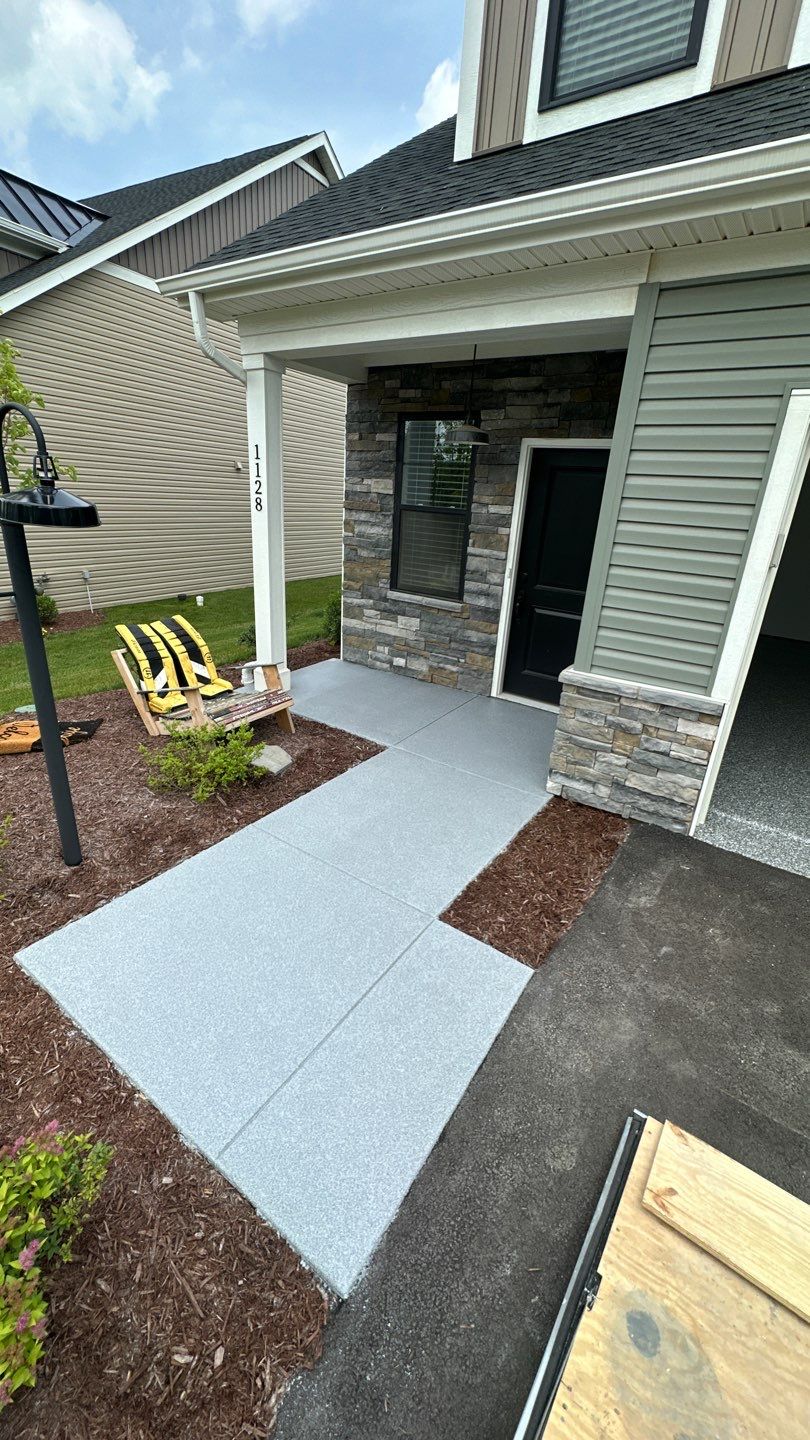 Porch + Garage Project in Evans City by Floors in a Day, Inc