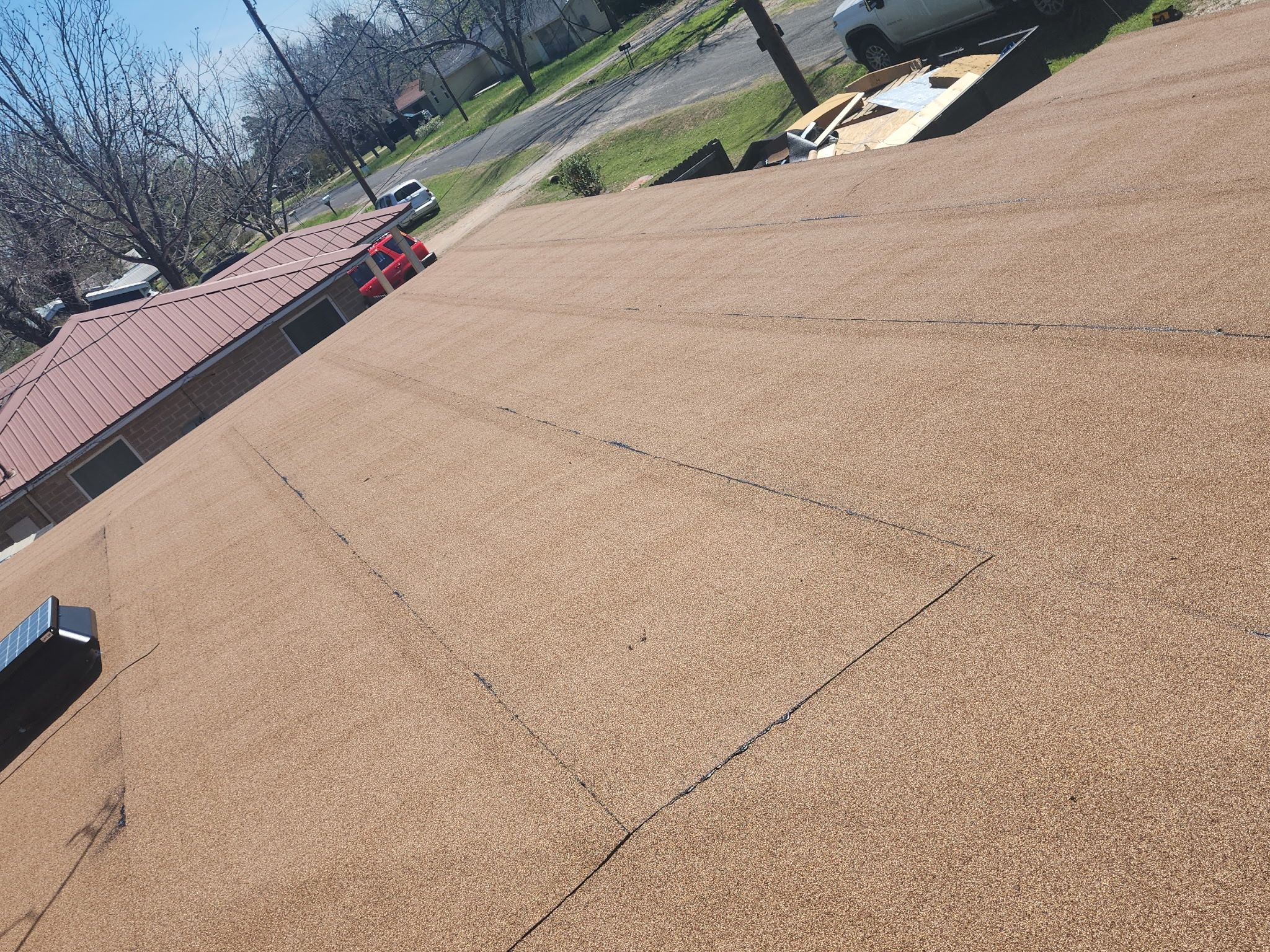 Torch down modified bitumen roof and full fascia "face-lift" in Elgin, TX by REPS OF TEXAS