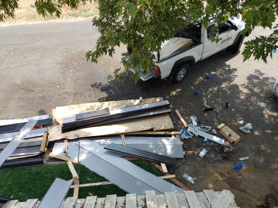 Residential Roofing Installation using Standing seam metal roofing system by Straight Edge Roofing Inc