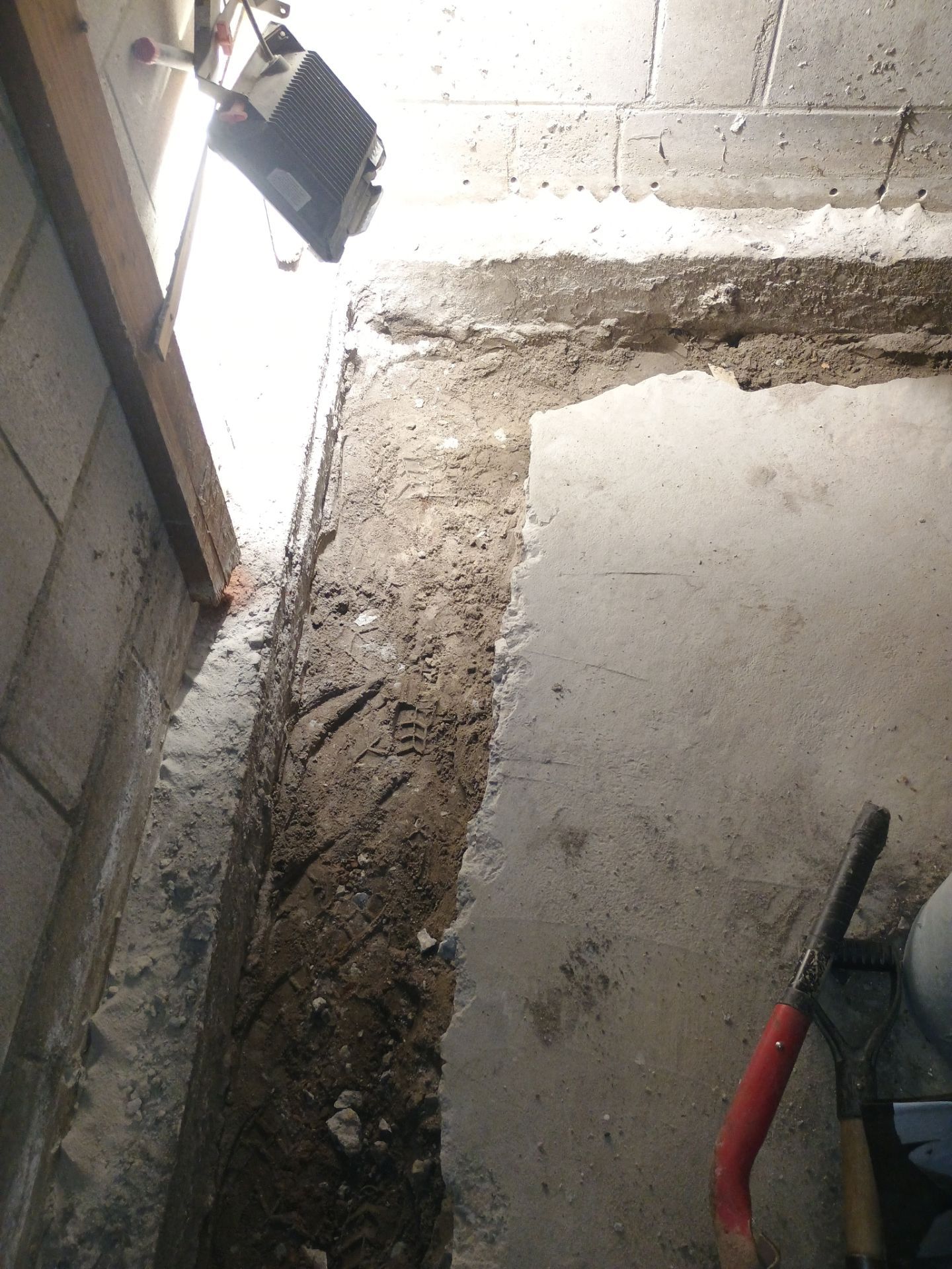 Interior Drain Tile & Buried Discharge in South Minneapolis by Waterproofing Northeast