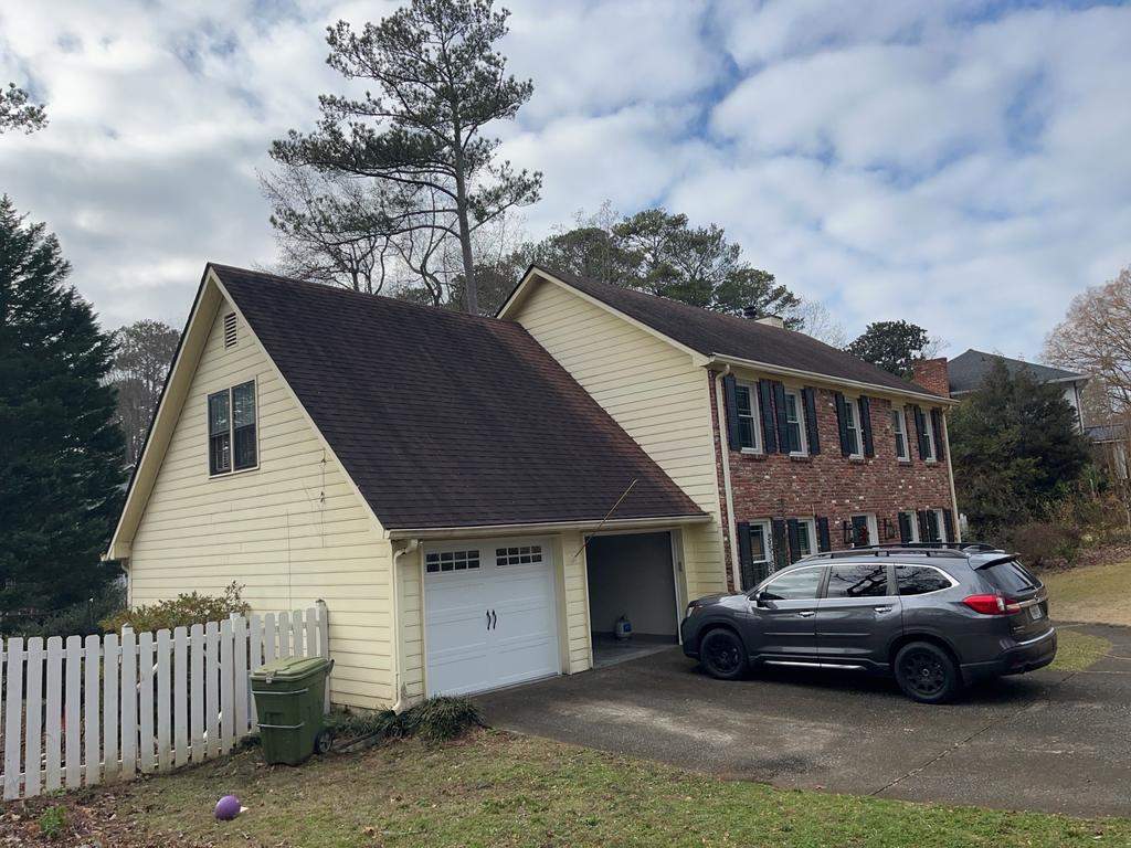 Marietta, GA Siding Replacement, Exterior Paint, Gutter Replacement, and Chimney Cap Installation by Nelson Exteriors 