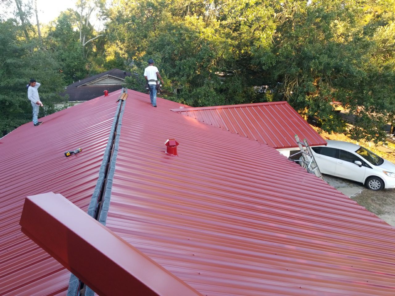 Residential Roofing Installation using Metal roofing by American Roofing & Construction LLC