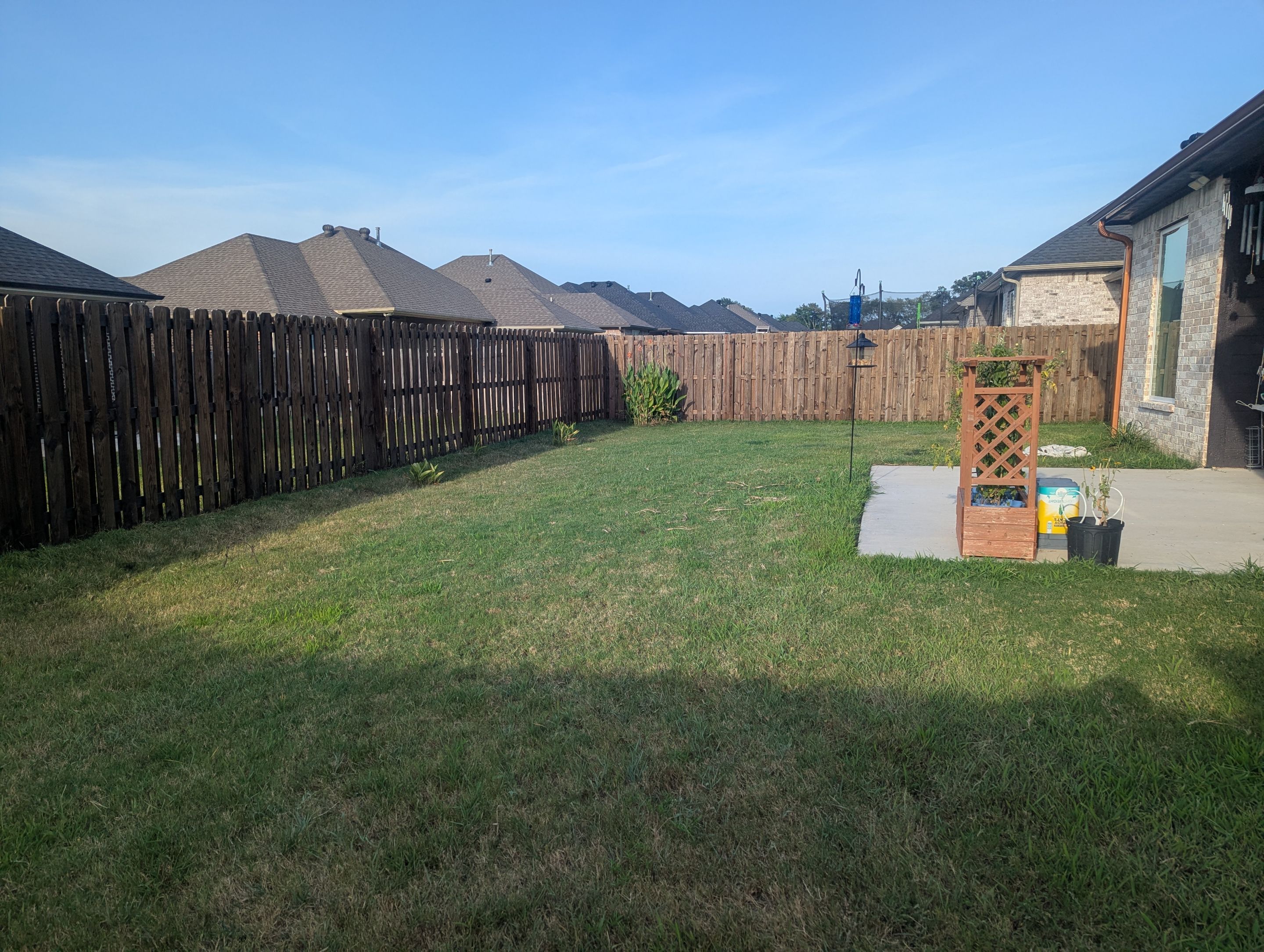 Touching Up a Fence in Whitehouse by Quality Coats Painting