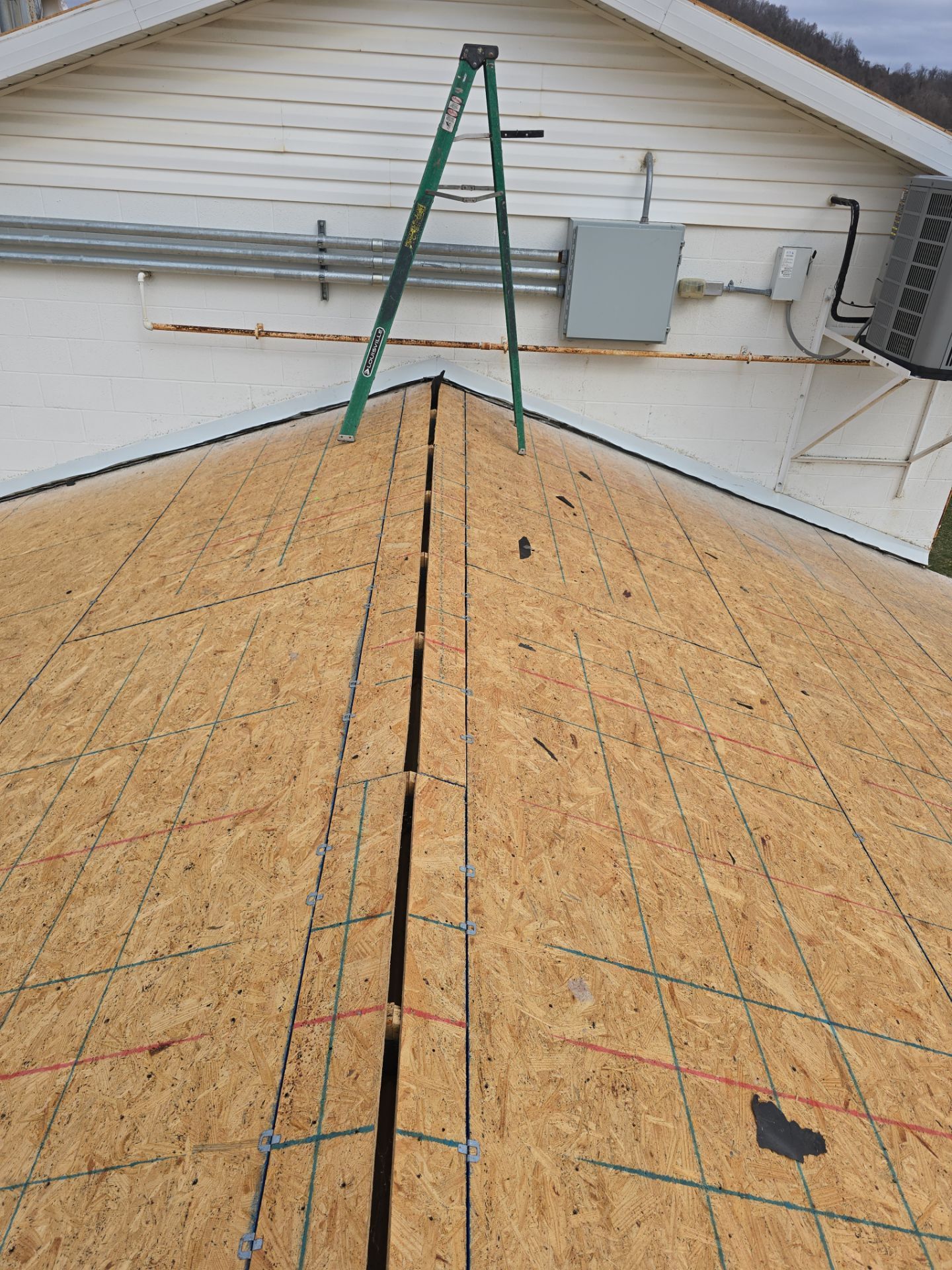 Commercial Roofing Installation using Metal by Rainstoppers Roofing