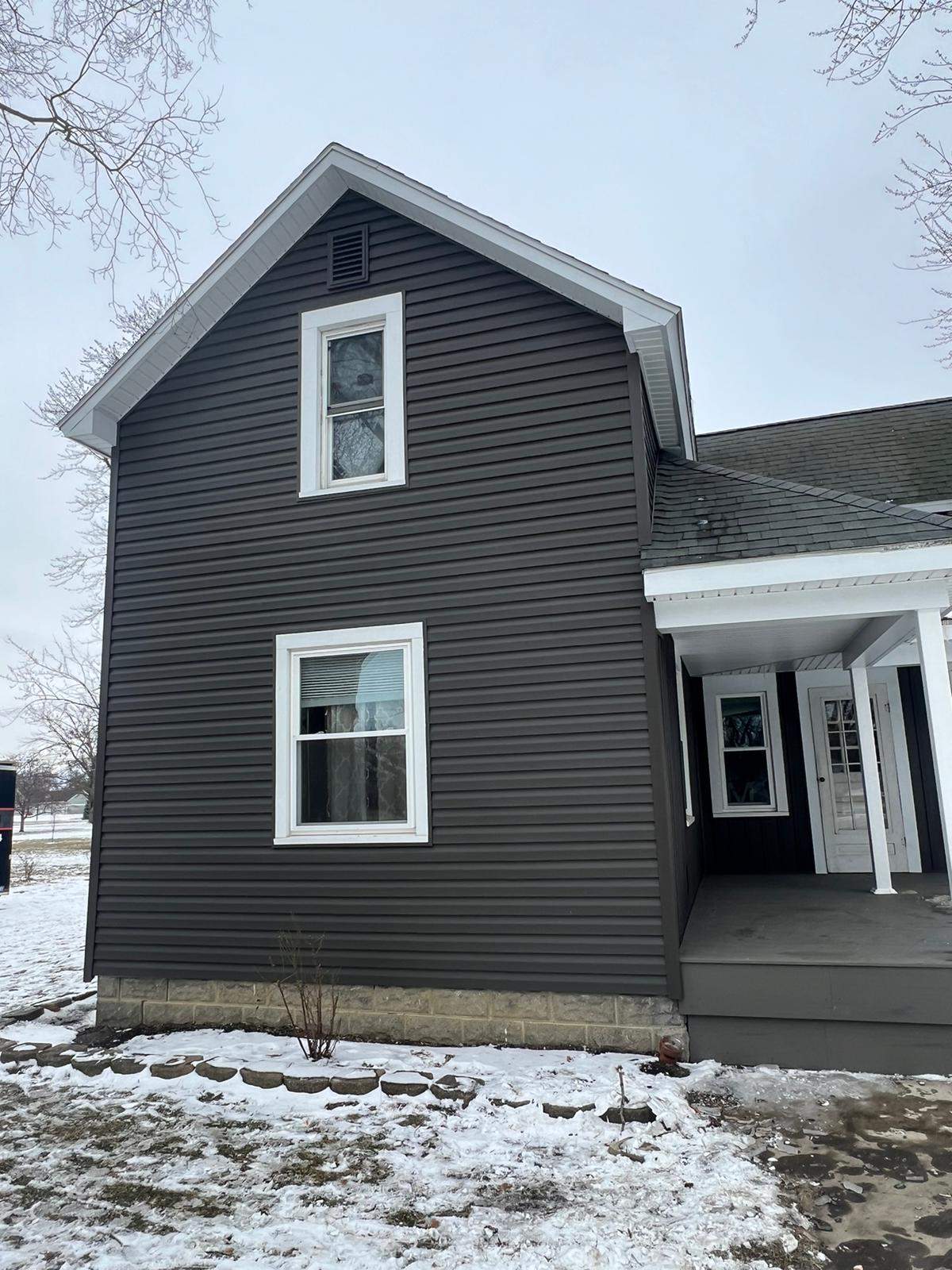 Residential fascia replacement using Exterior Portfolio 4.5 DL - Peppercorn by Nitro Roofing and Construction