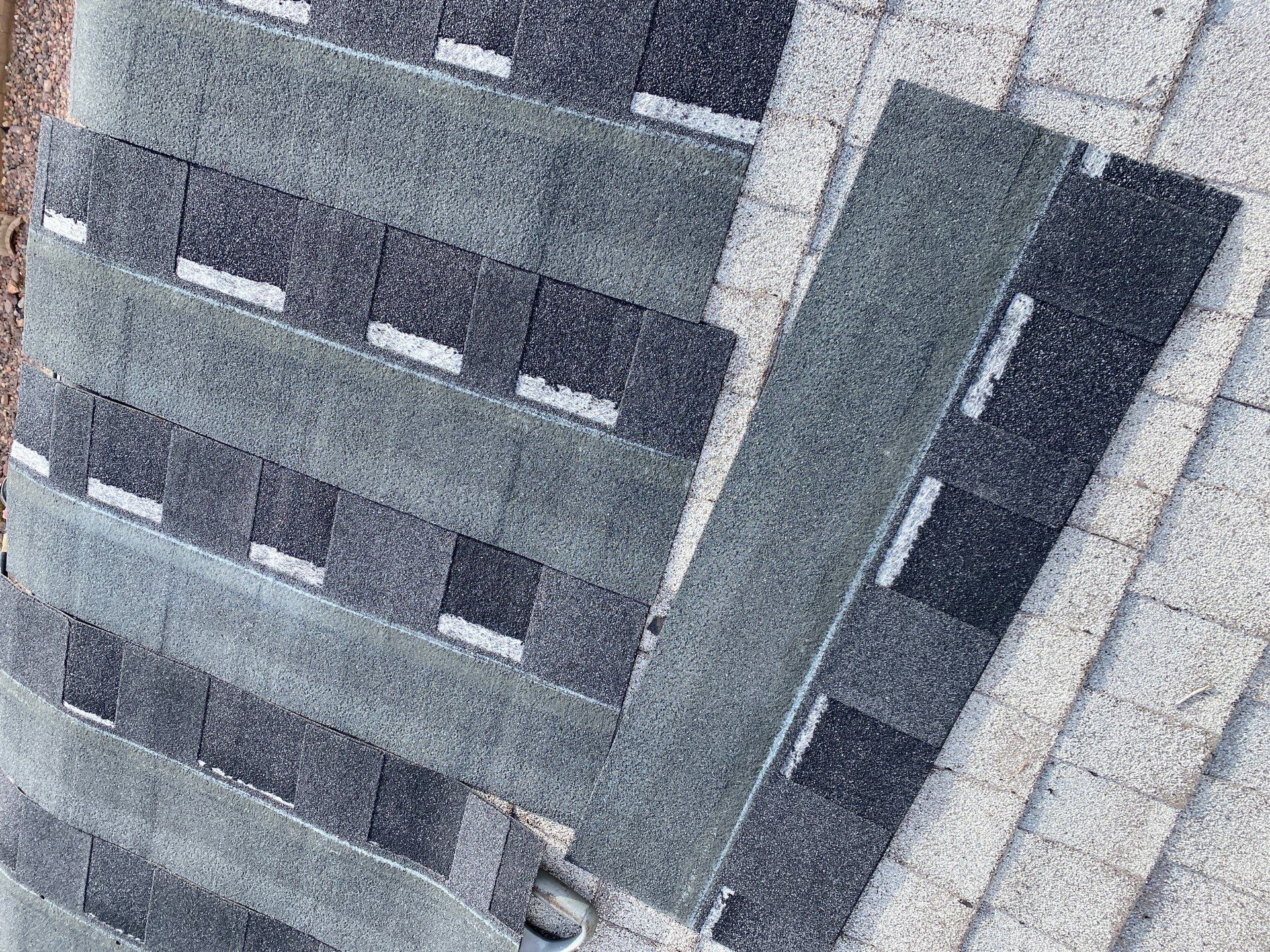 Onyx Black Shingles by Reimagine Roofing