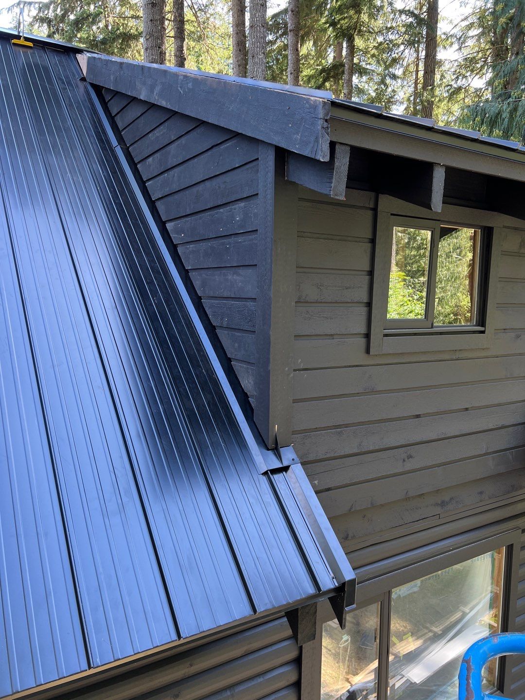 Residential ReRoofing Installation using 12" Prolok metal  by Top Notch Roofing Inc