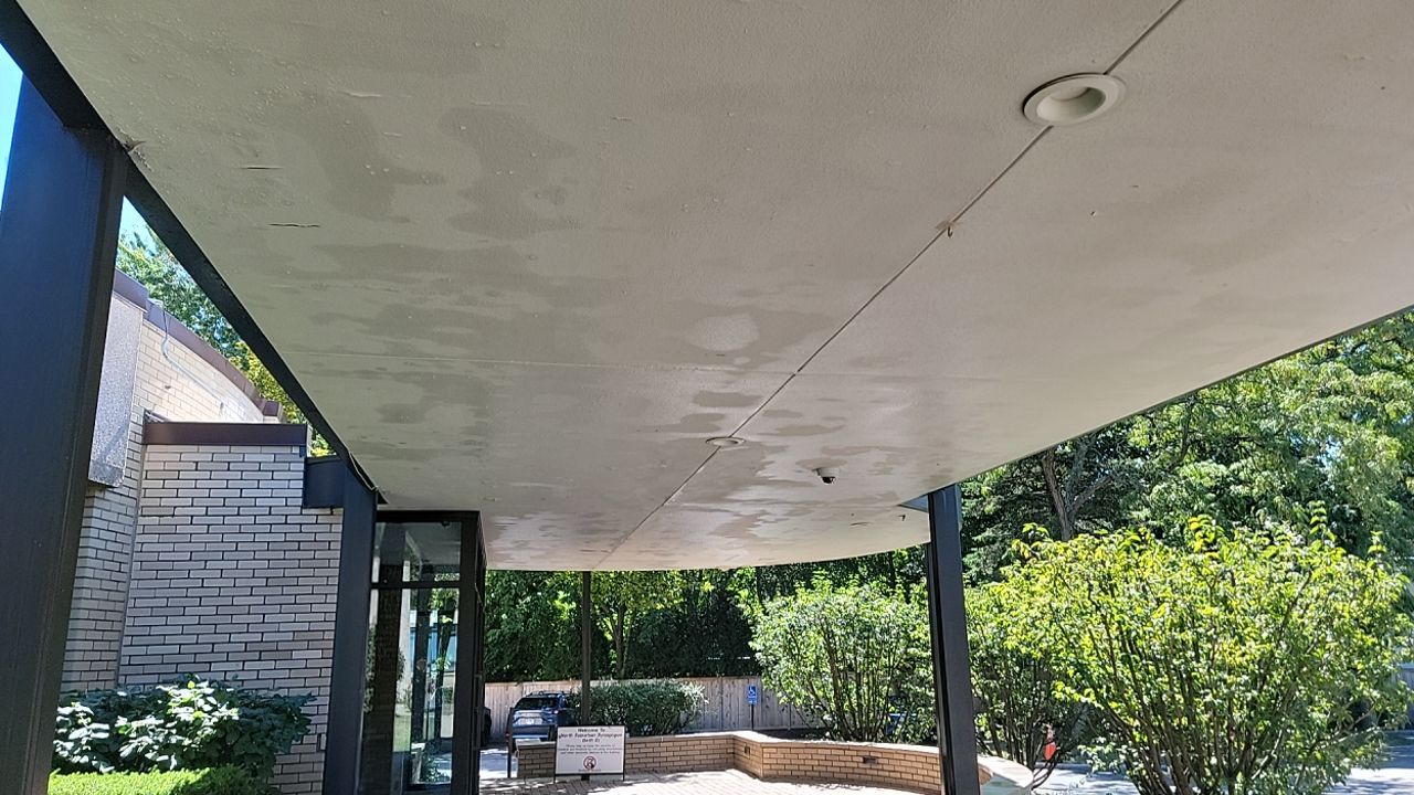 commercial pressure washing using Algaecide, soft wash soap by Northern Power Washing LLC.