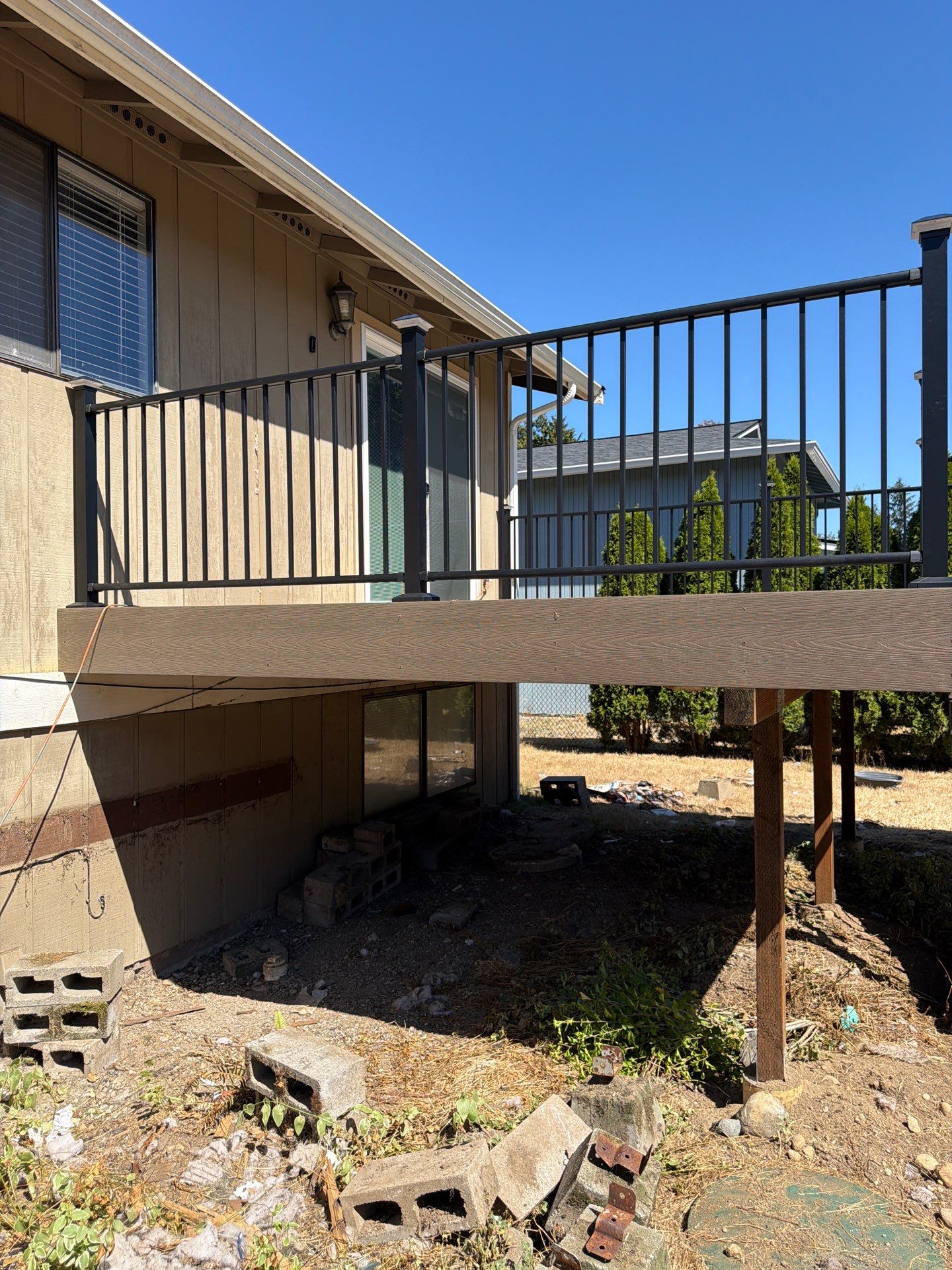 Composite Deck Installation with Black Metal Railings in Bonney Lake by Expedeck