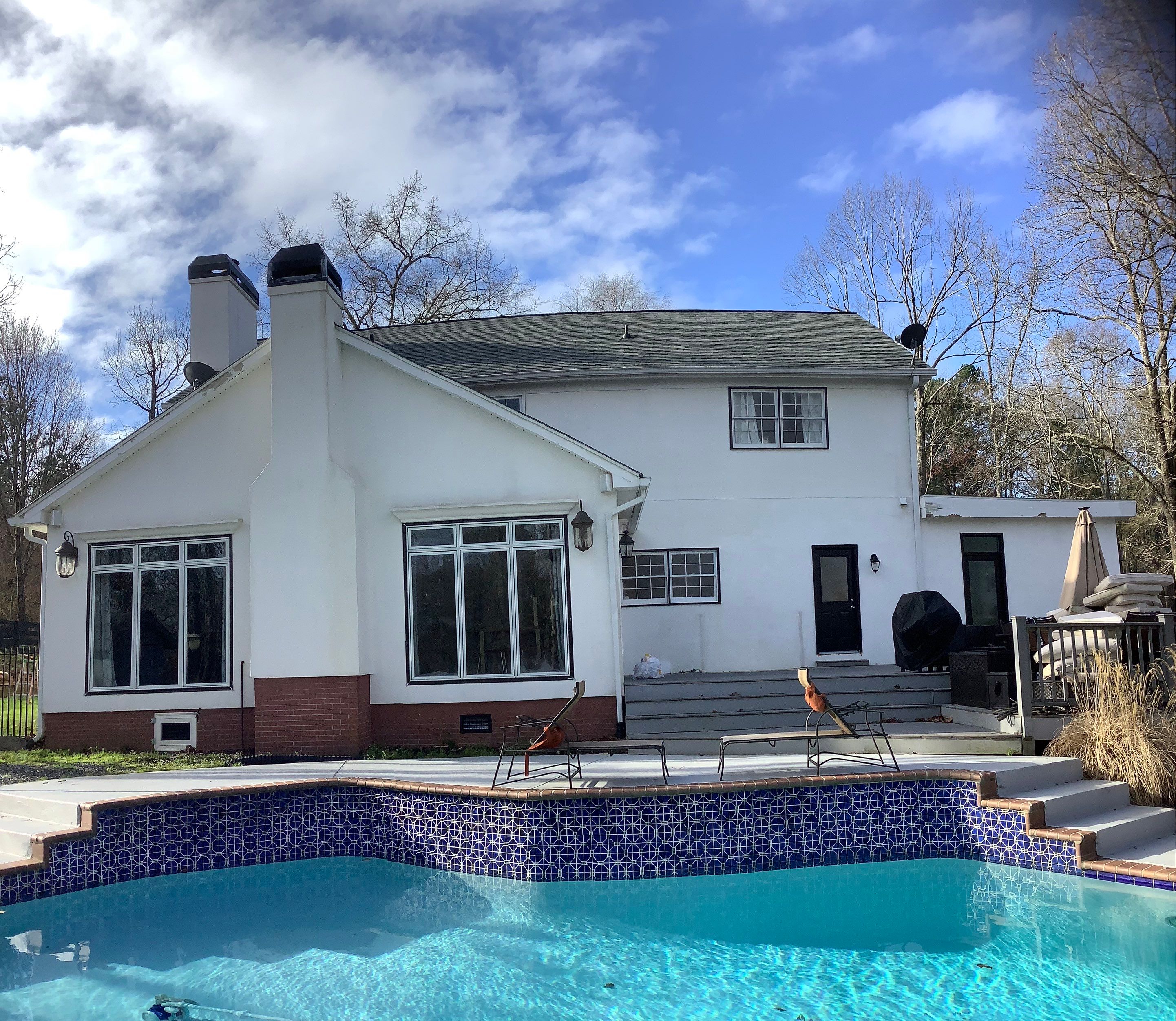 Full Exterior Repaint for Colonial Style Home in Cumming by Swift Home Renovations