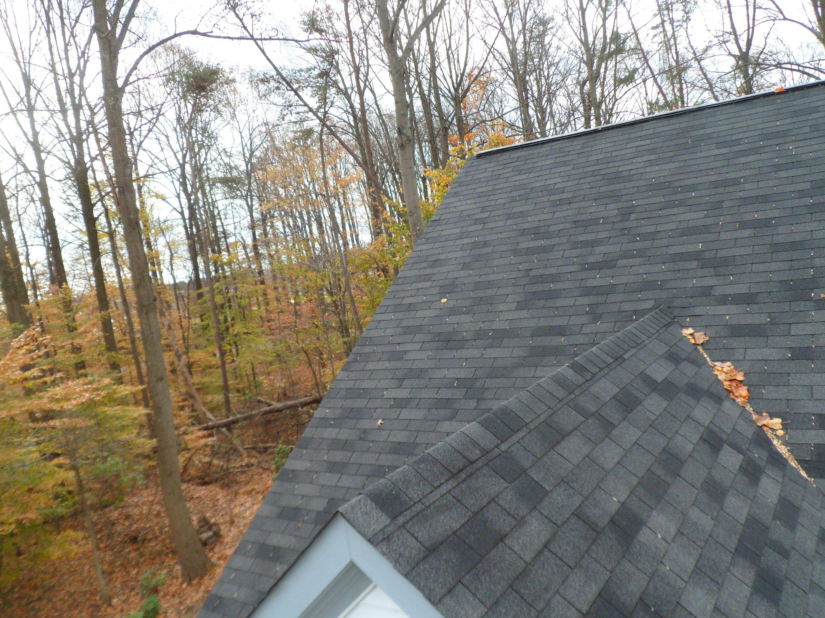 Residential Roofing Installation using Charcoal Black by Alpha Design Services