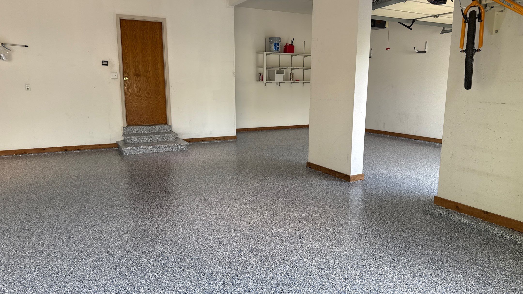 Custom "Comet" Epoxy Garage Floor Renovation in Lawrence by Banner Garage