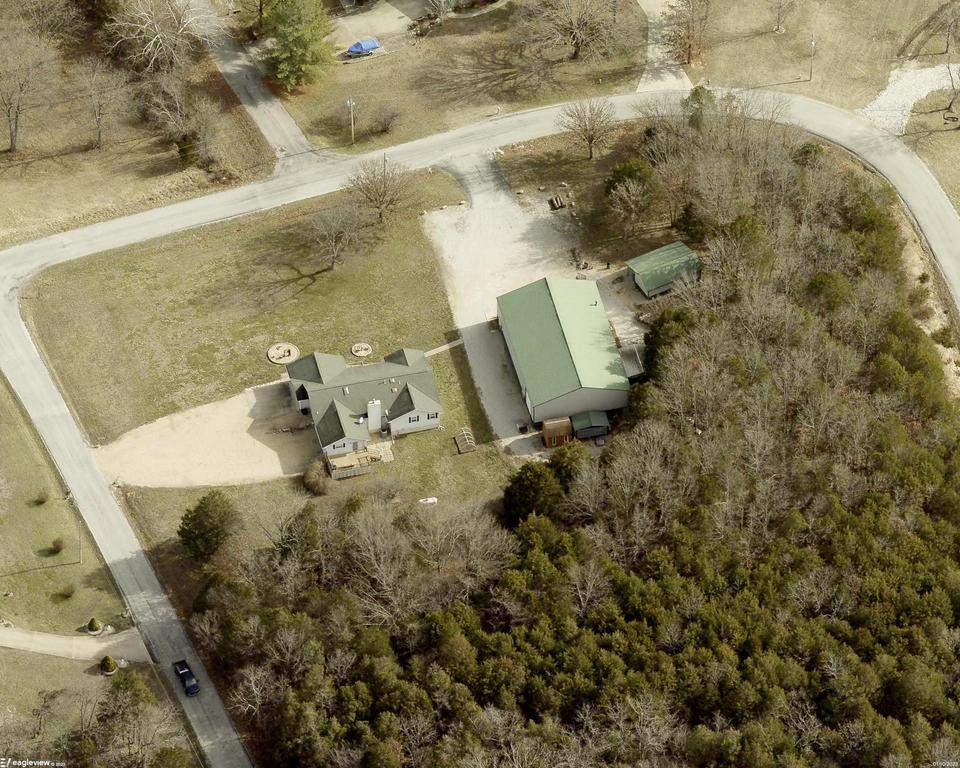 Roof Replacement & Seamless Gutters in Cape Fair by Table Rock Design + Build