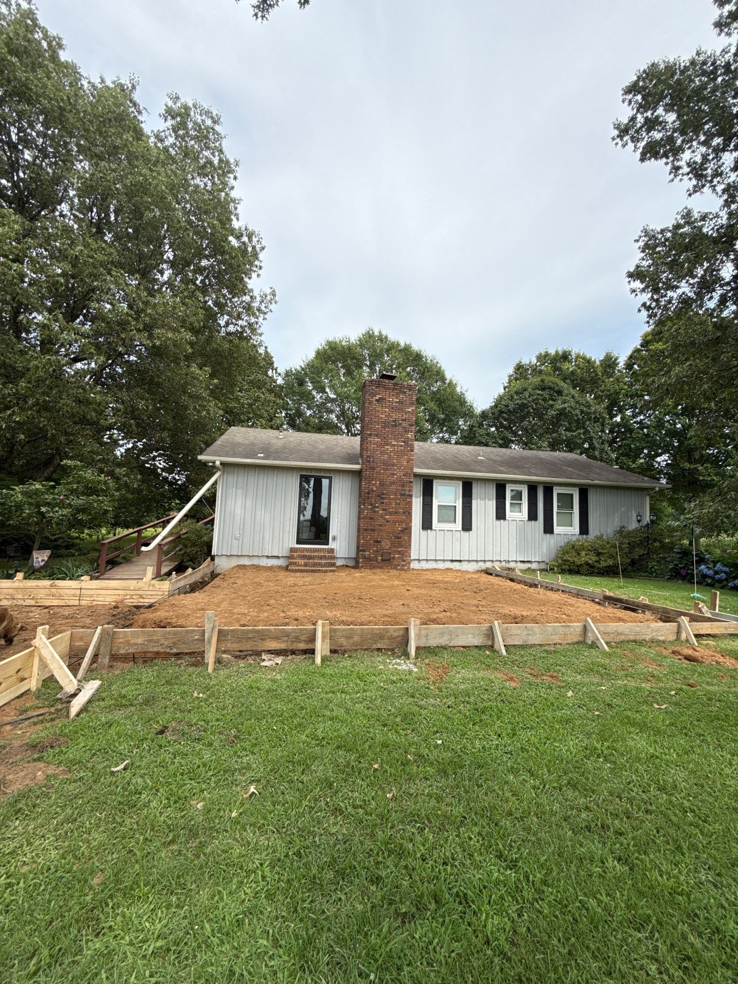 Sunroom and Garage Addition by Skilled Construction LLC