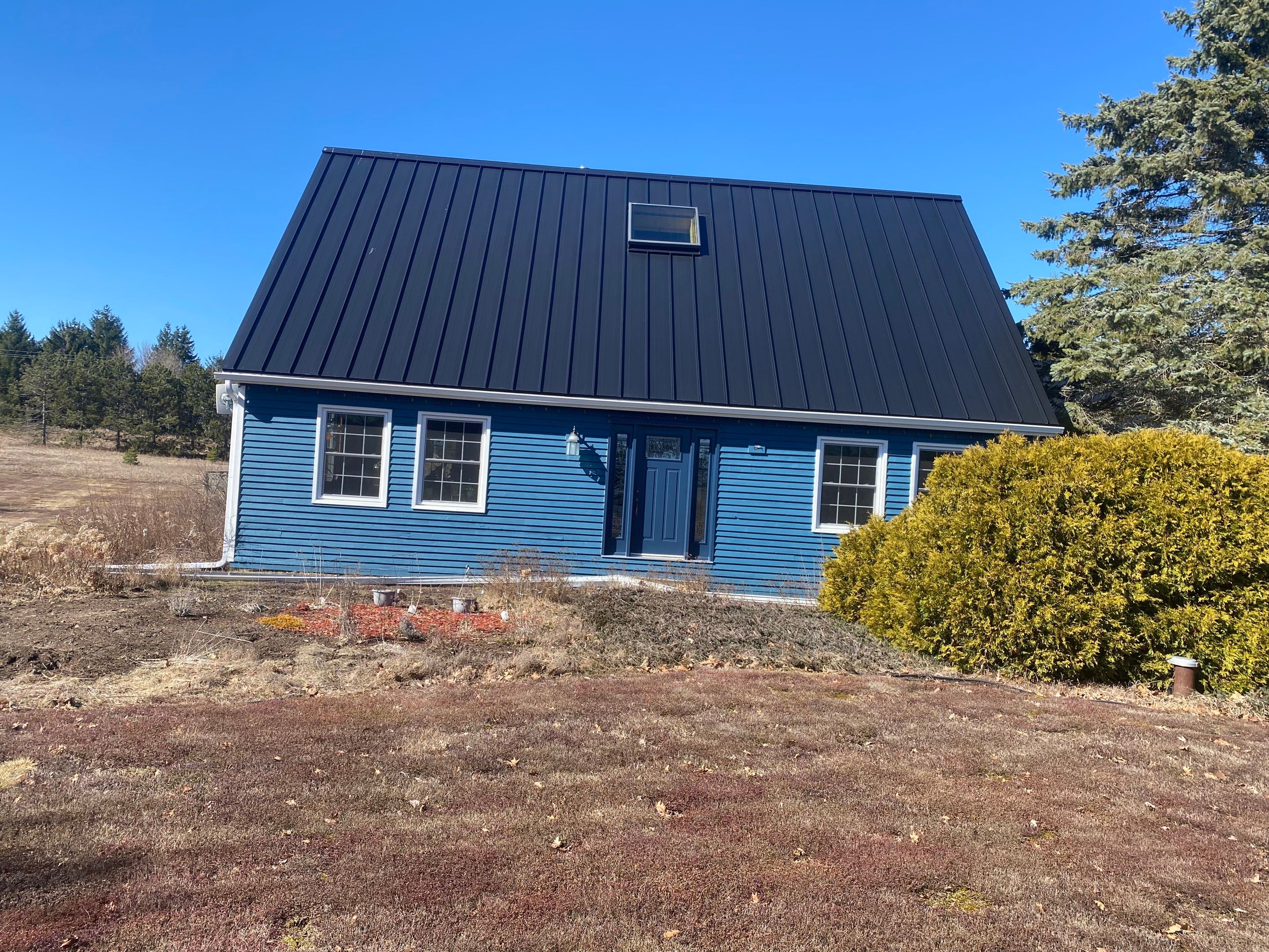 Residential Roofing Installation using 24 Ga Standing Seam Metal  by Jay Carter Roofing & Sheet Metal