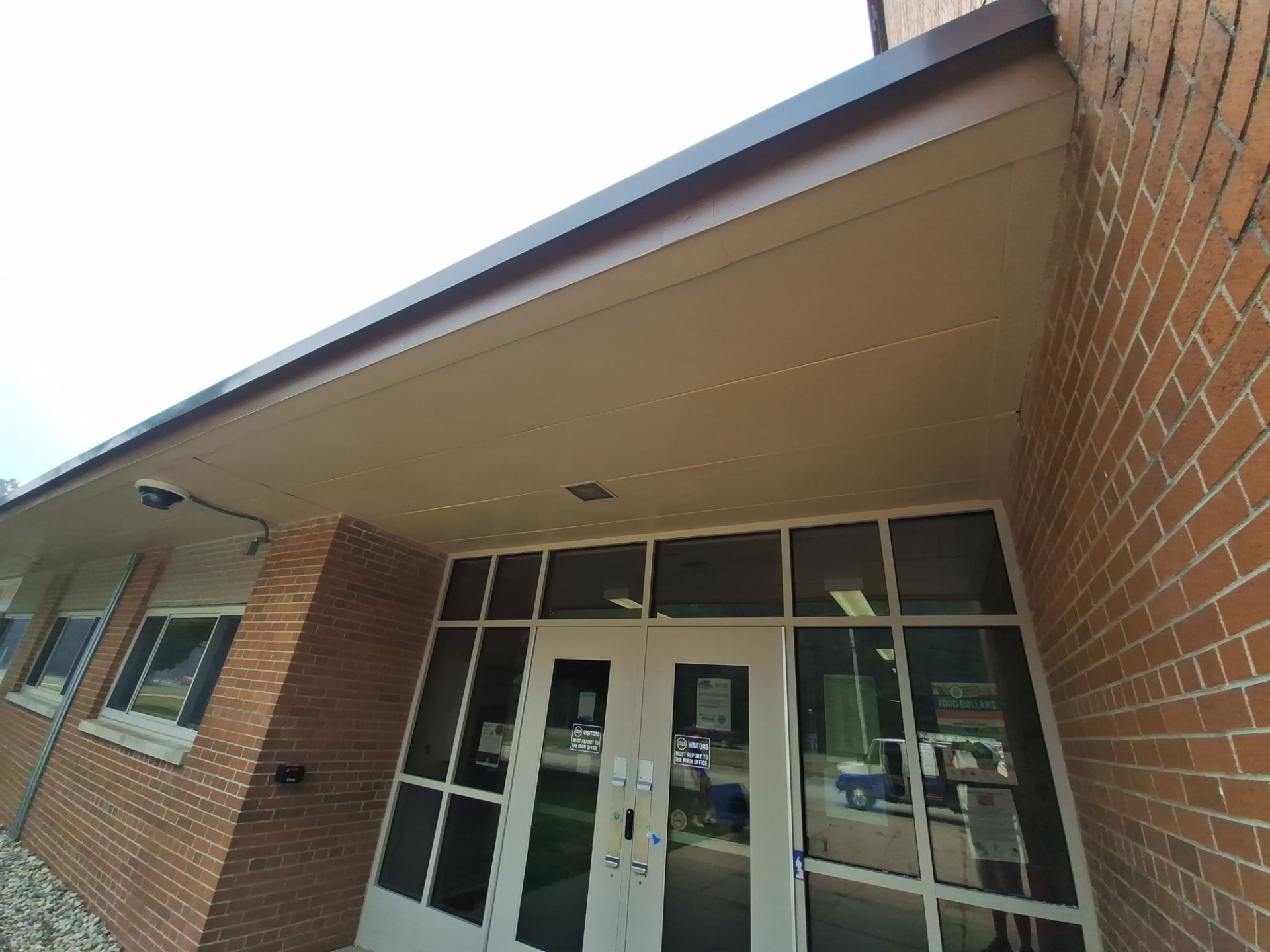 Commercial Exterior Pressure Washing and Soffit Preparation in Muskegon by Gordon Painting