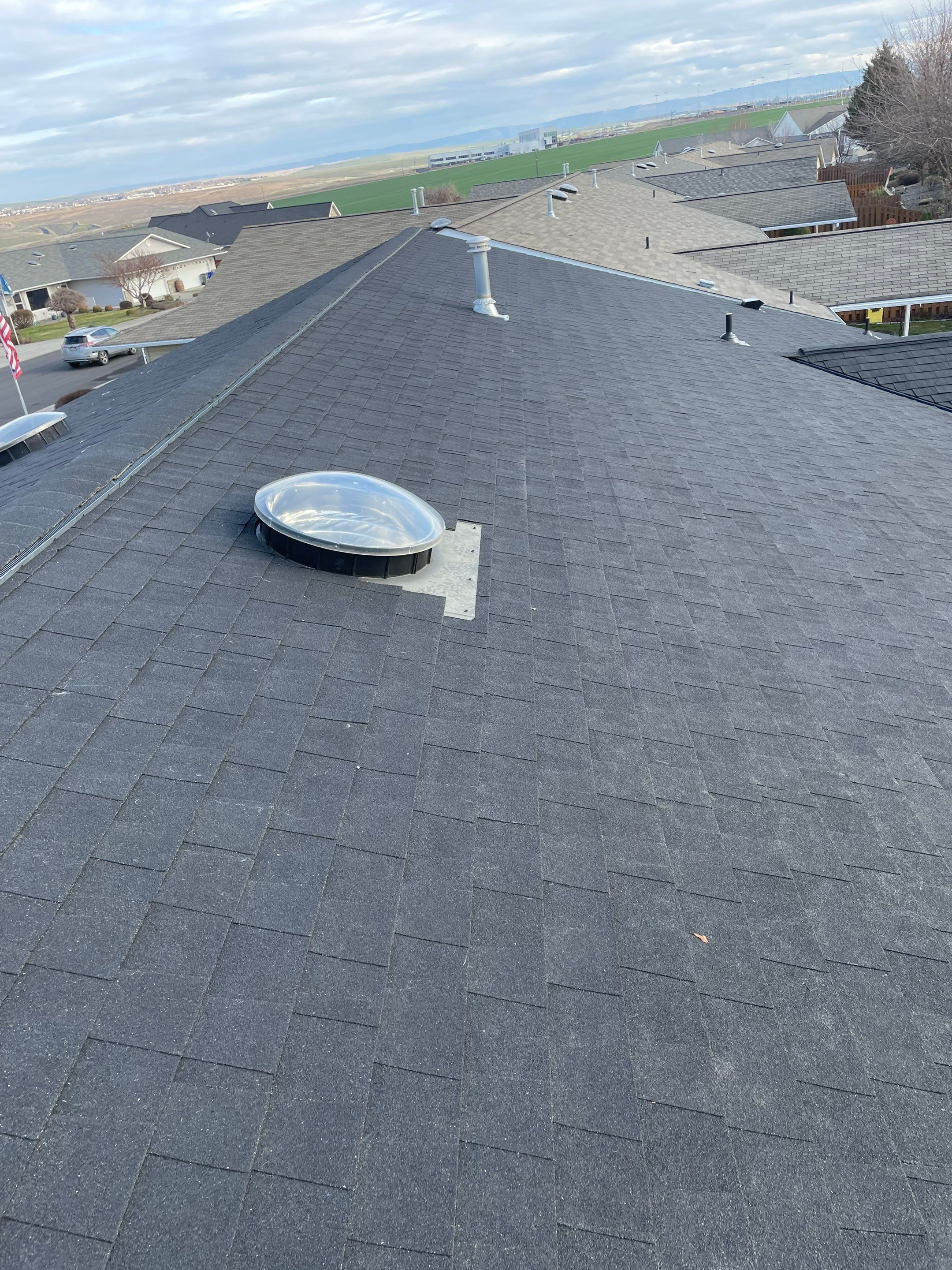 Complete Roof Replacement and Skylight Integration in Lewiston by Alpine Roofing