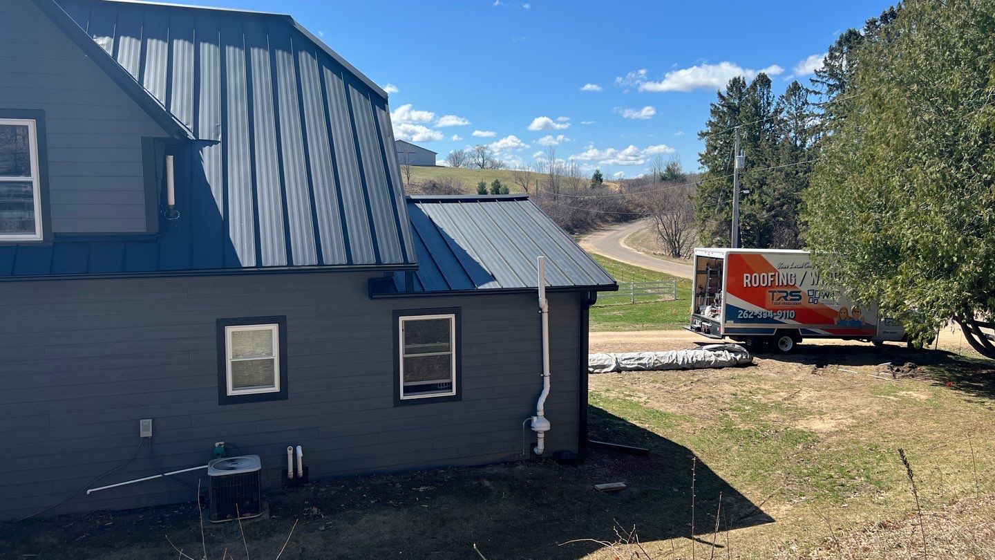  Stunning Home Exterior Makeover | Metal Roofing & LP Smart Siding by Total Restoration Services by LeFever Roofing LLC