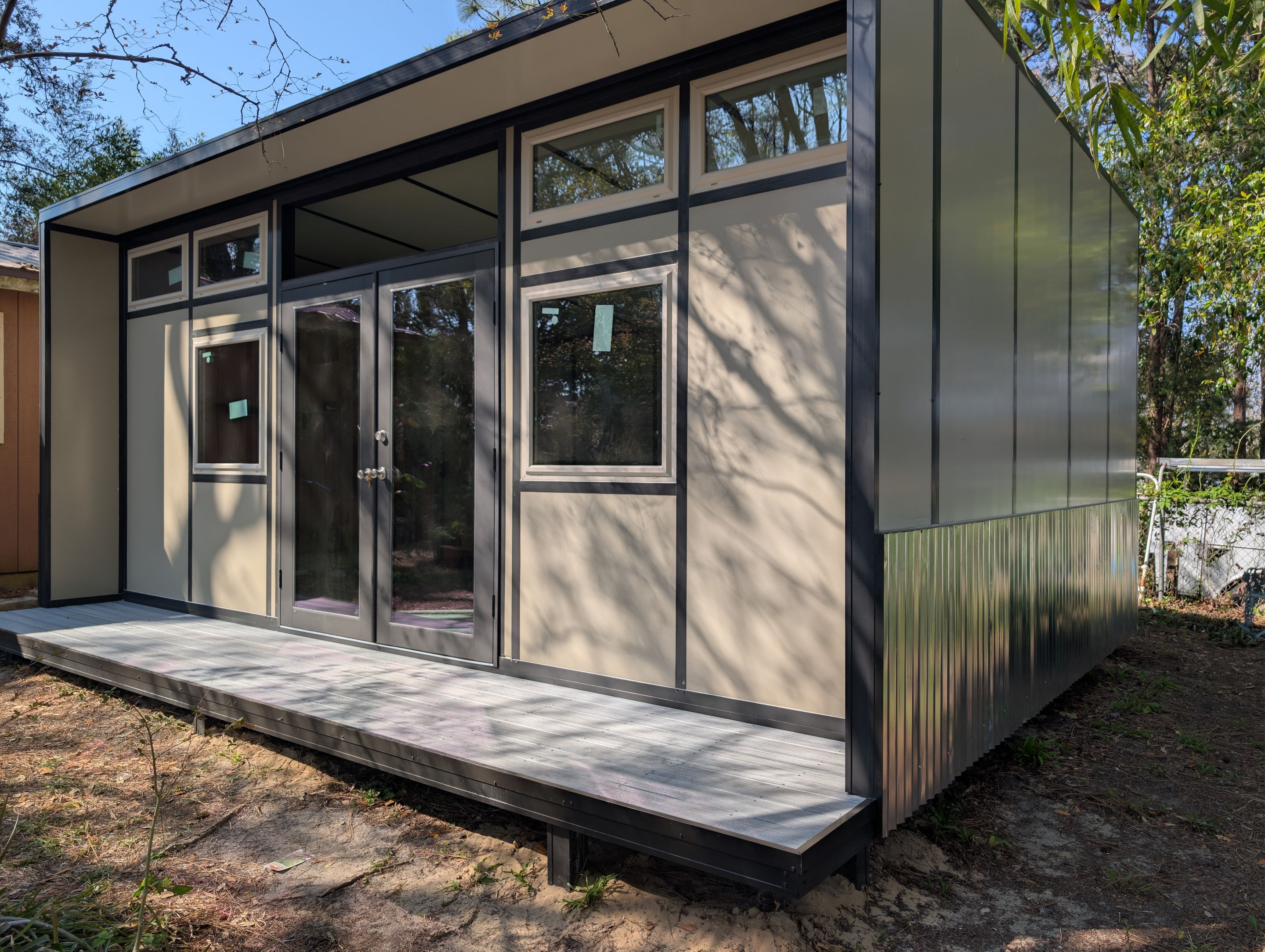 Titan Blockhouse Backyard Home Addition by Titan Sunrooms