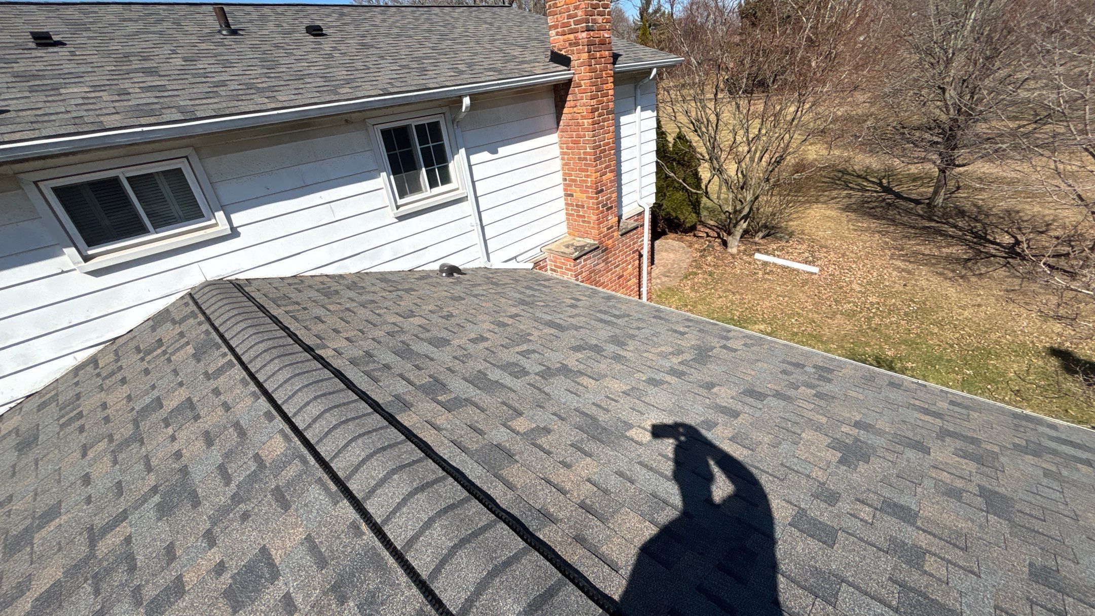 Siding Replacement using Alside Charcoal Smoke and Roof Replacement using Owens Corning Peppercorn by 180 Contractors