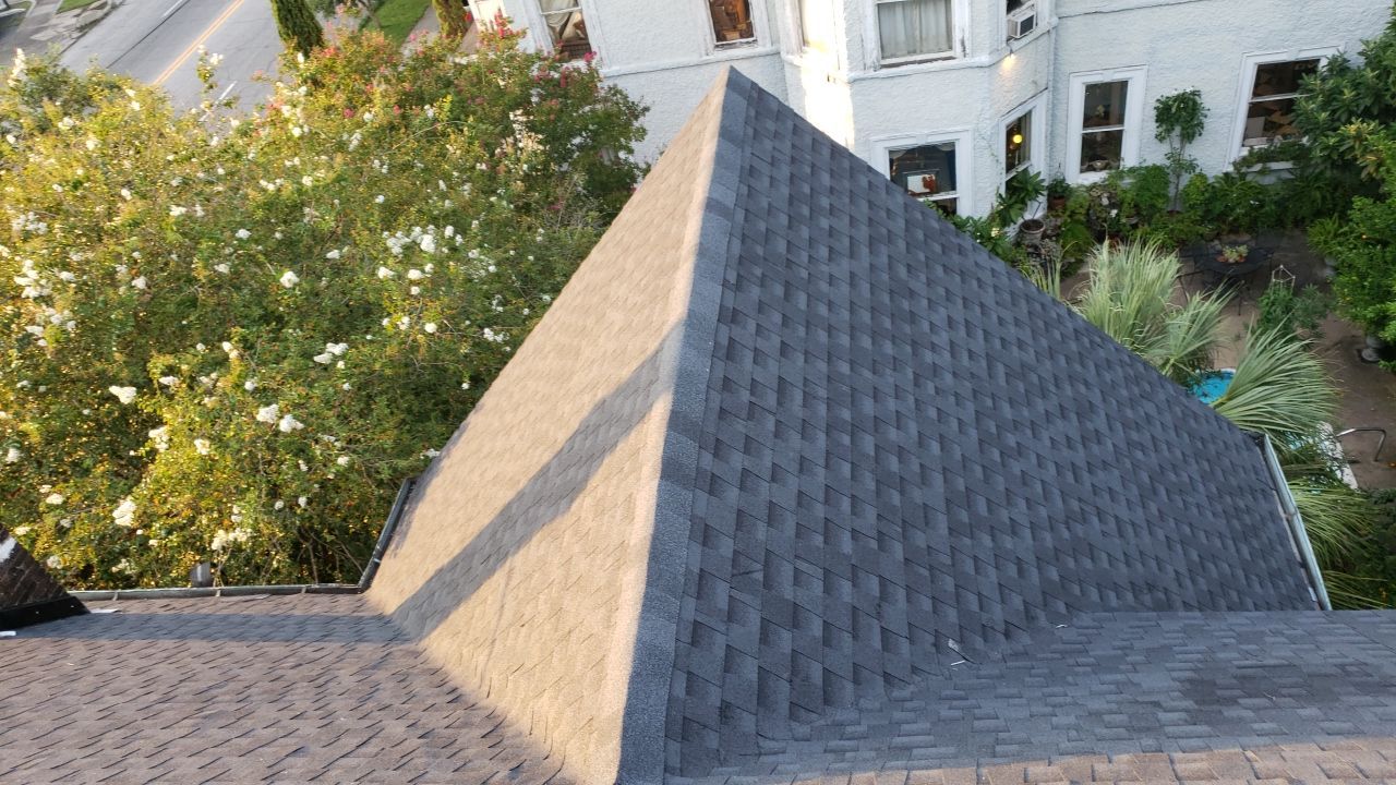 Residential Roofing Installation using Roof Replacement by American Roofing & Construction LLC