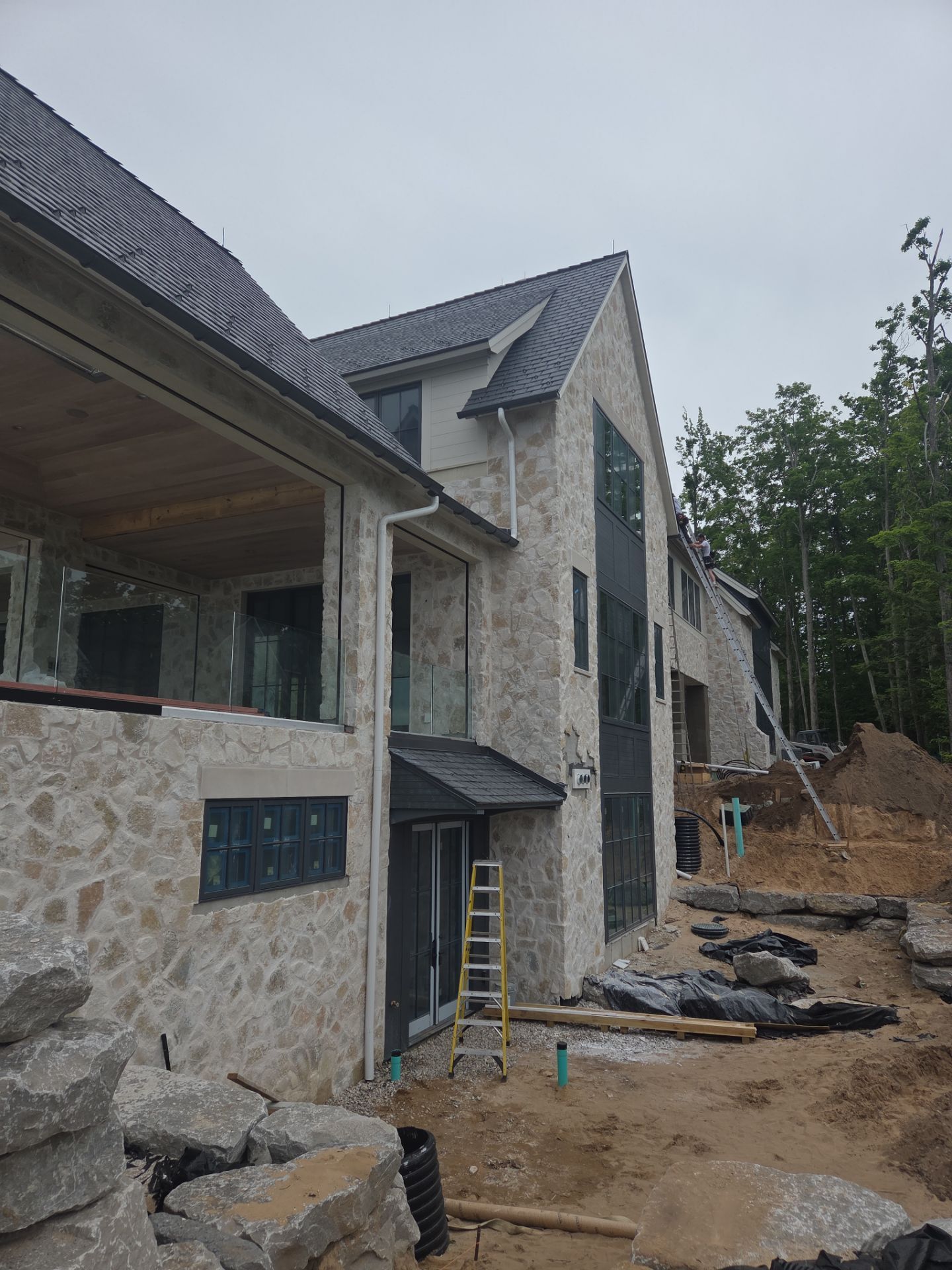 Half Round Gutter Installation for Petoskey Residence by Rainbow Seamless Systems