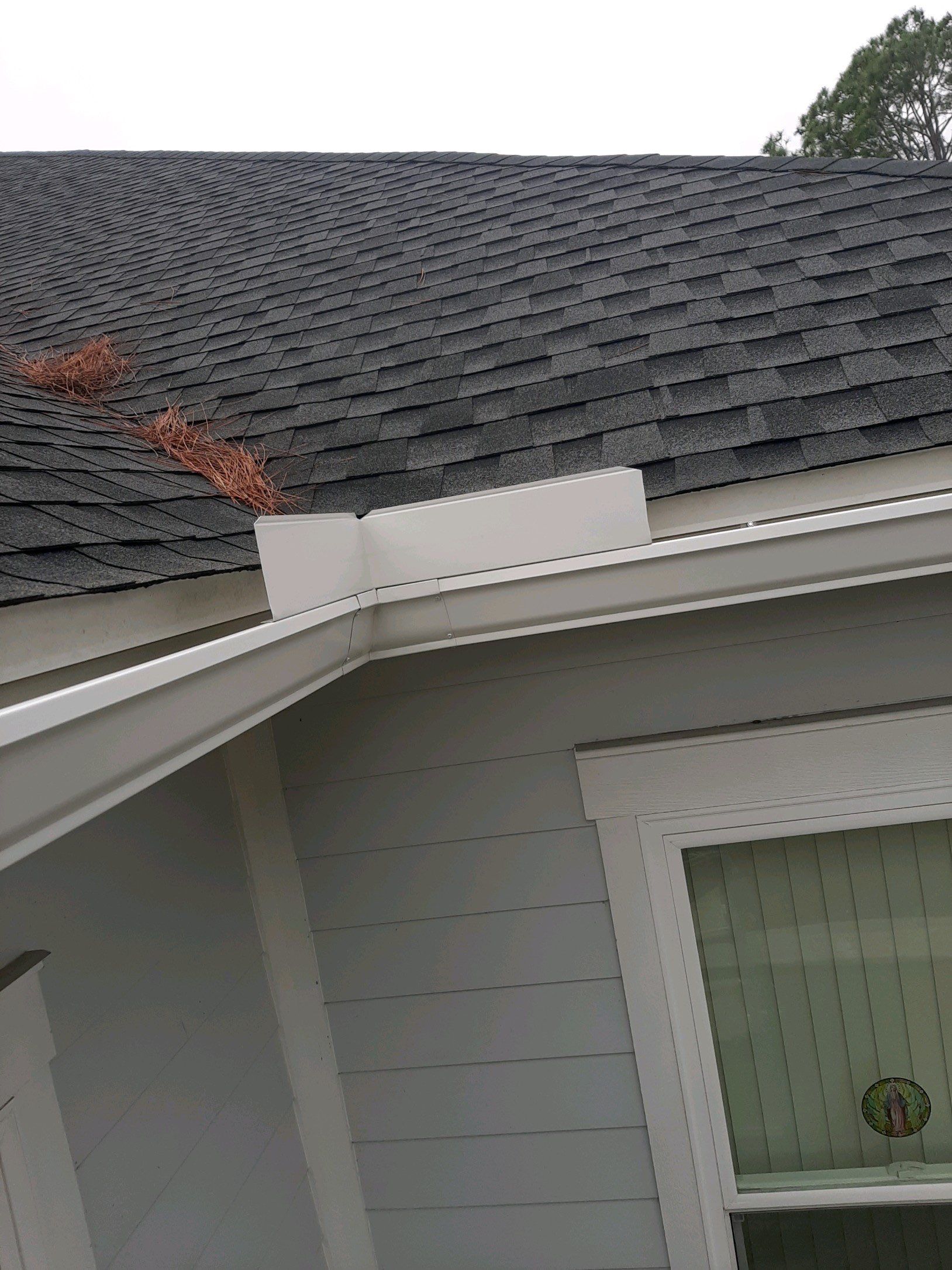 Gutter Installation using White K-Style Seamless Gutters by Gutter Professors