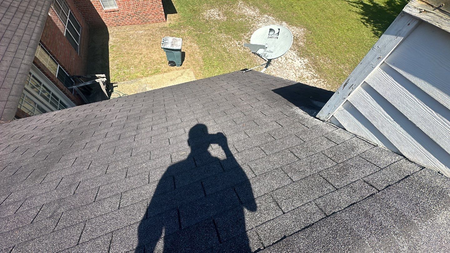Residential Roofing Installation using Benton 26Ga 1inc Snapcock Metal Roof KYNAR Matte Black by Talya Roofing
