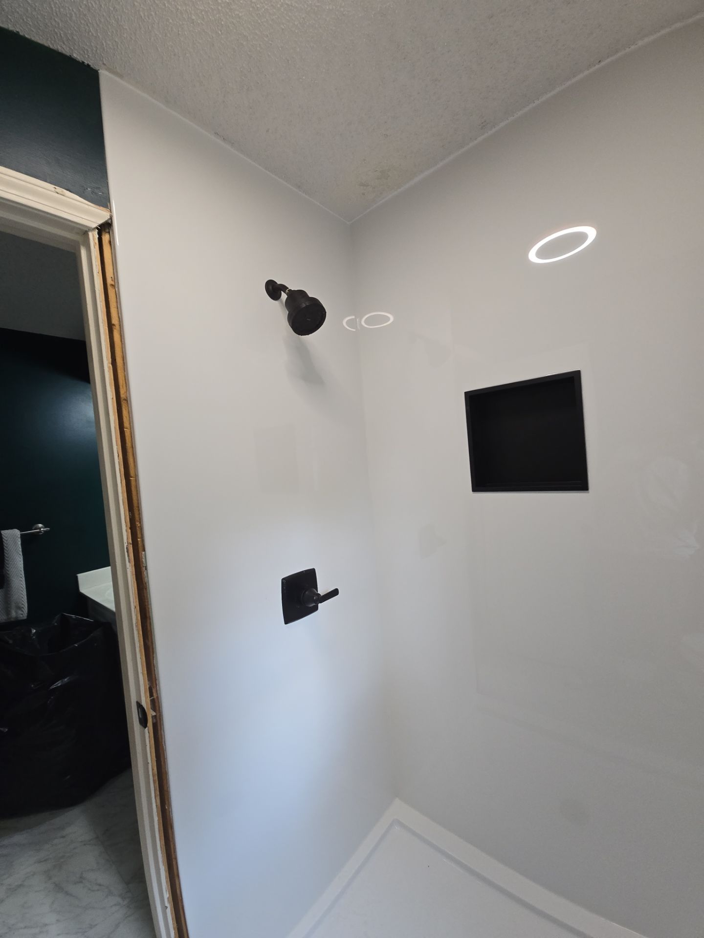 Tile out, Bella Stone in! by The Shower Company