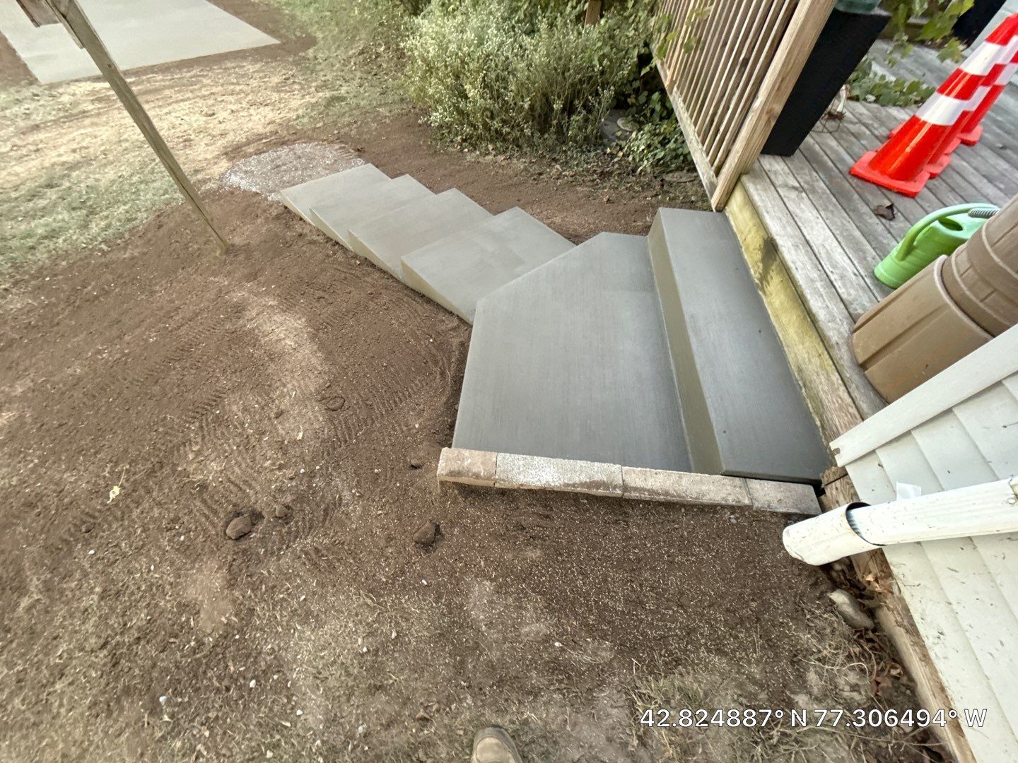 Broom finished concrete pad and steps  by NG Masonry & Construction LLC