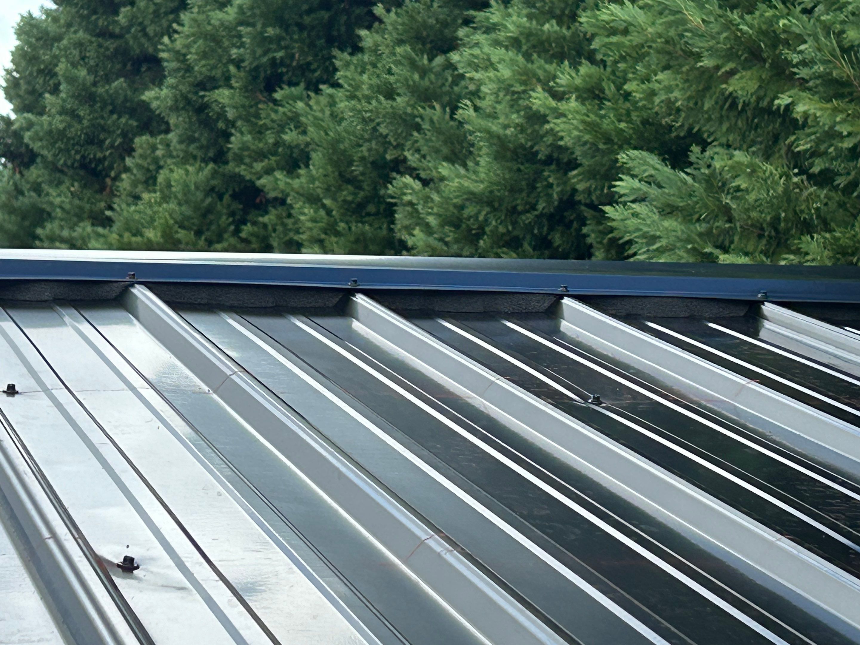 Storm Damage Repair and Garage Metal Roof Install  by Roofsters