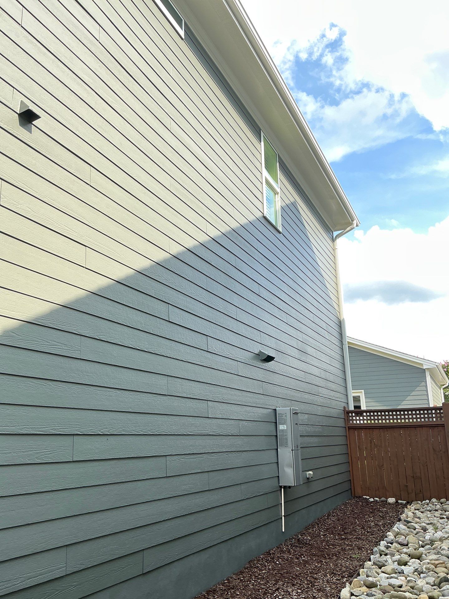 Siding replacement and exterior painting by GonzalezPainters & Contractors Inc