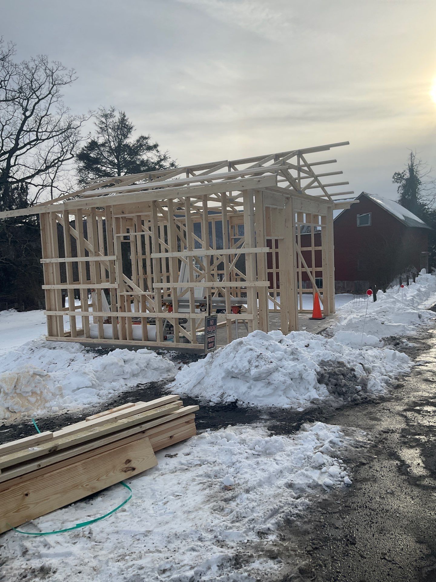 New Red Metal Garage Construction and Residential Window Replacement in Ashland by Esh Builders