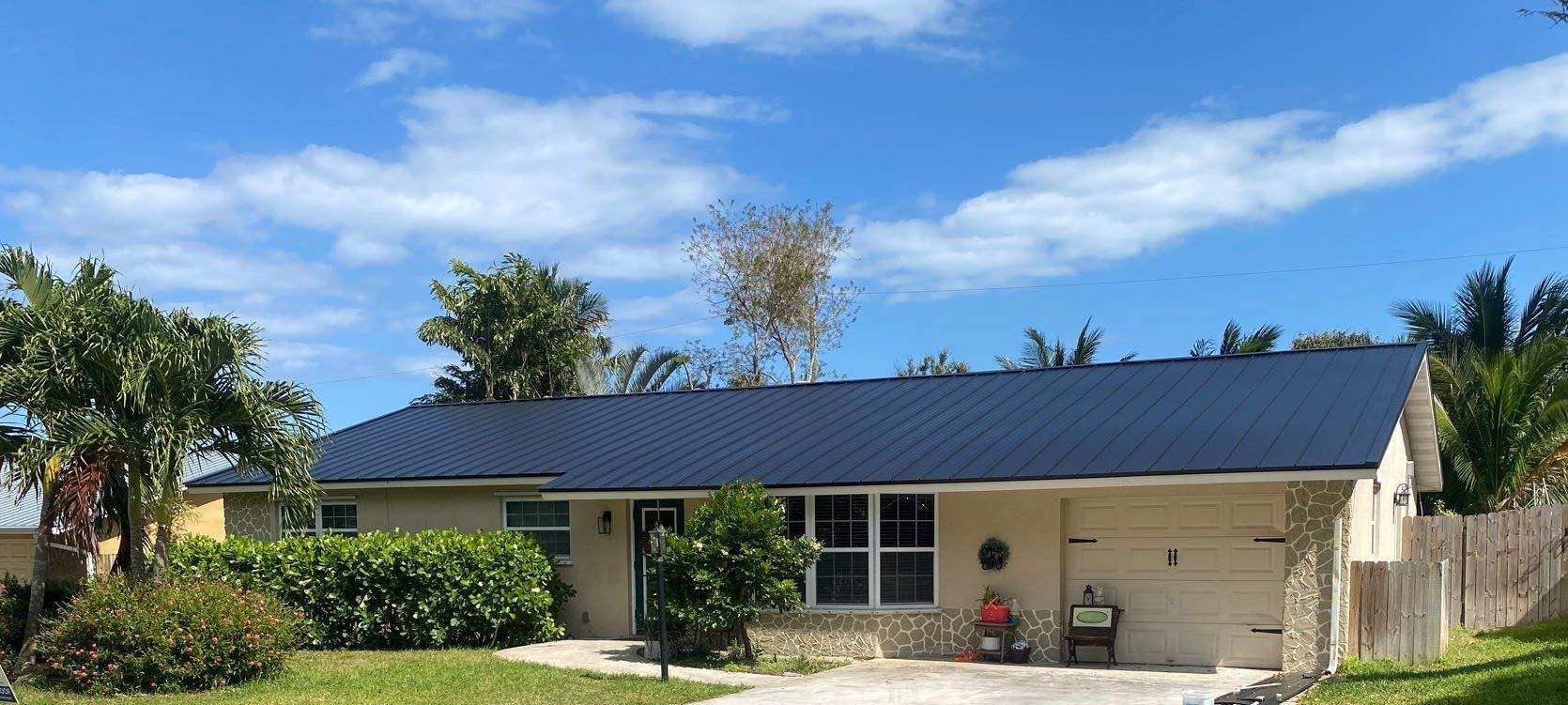 Kynar (Color Coated) Standing Seam Metal Roof Replacement by Sailfish Roofing