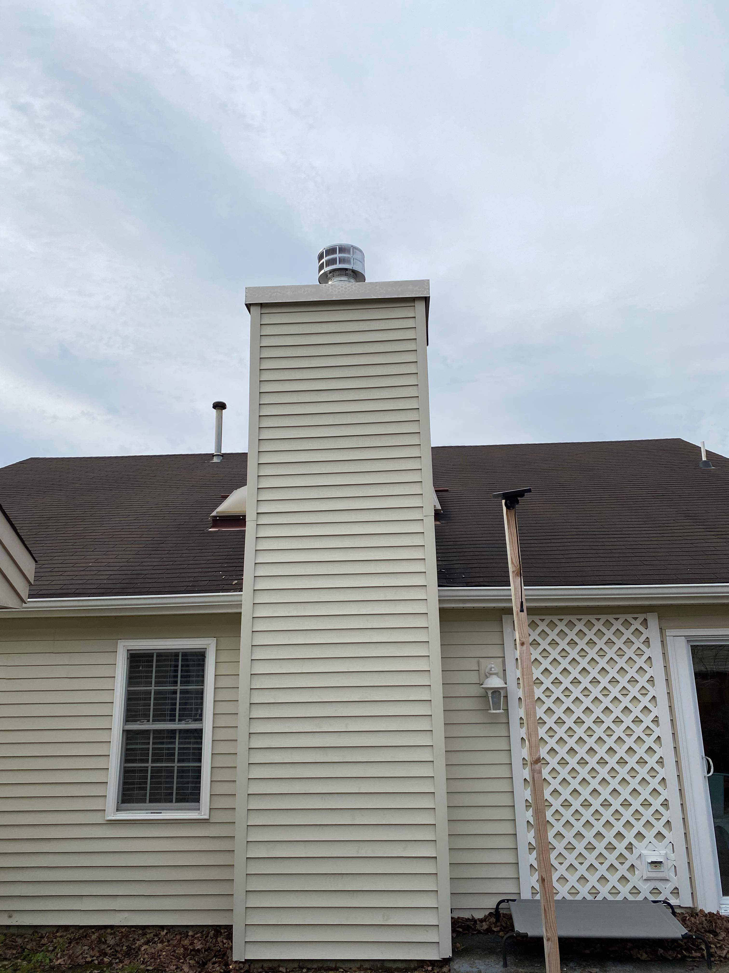 Wood Prefab Fireplace Replacement in Virginia Beach by Premier Chimney and Roofing