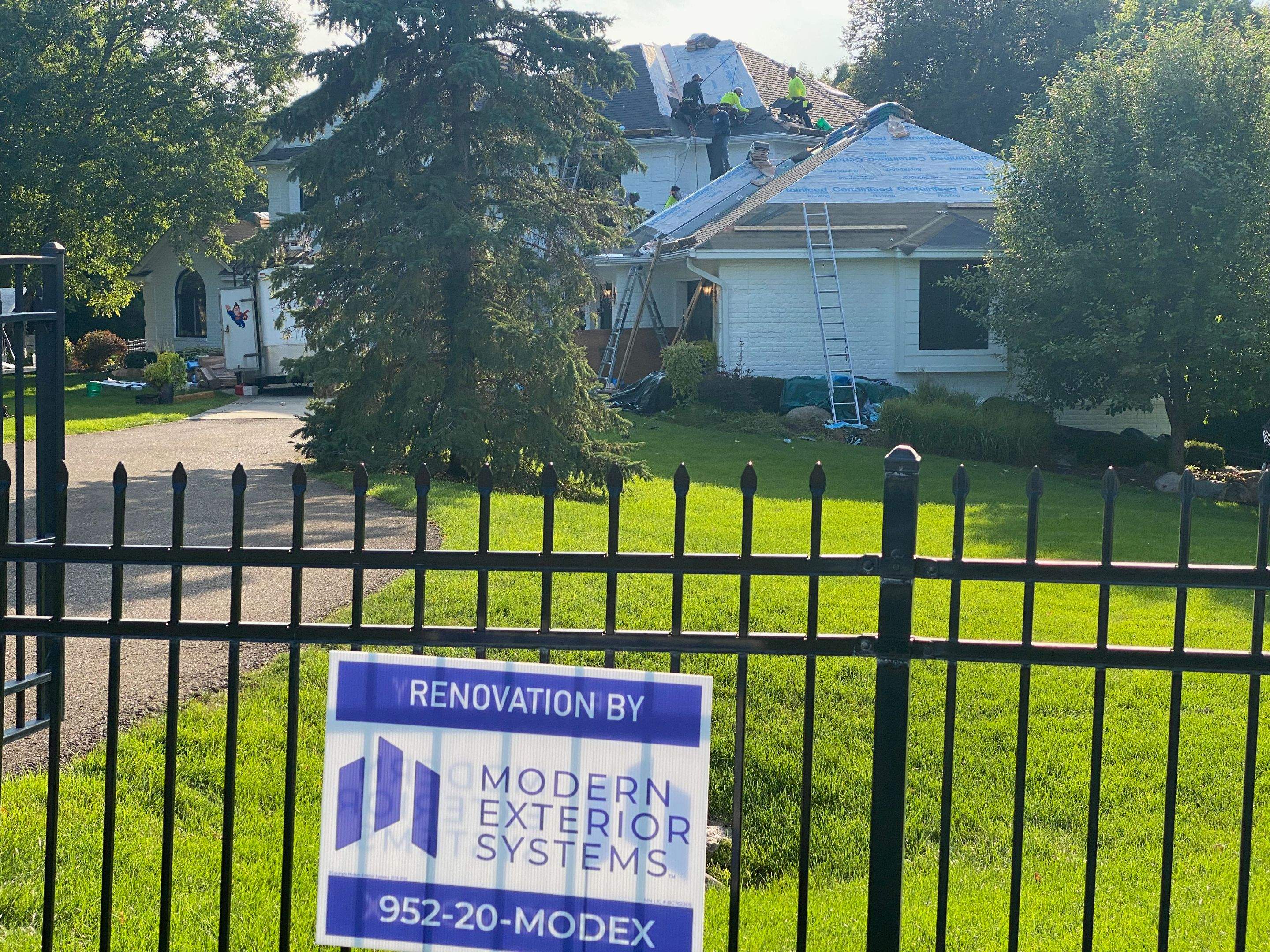 Residential Roofing Installation using Certainteed Landmark Moire Black by MODERN EXTERIOR SYSTEMS