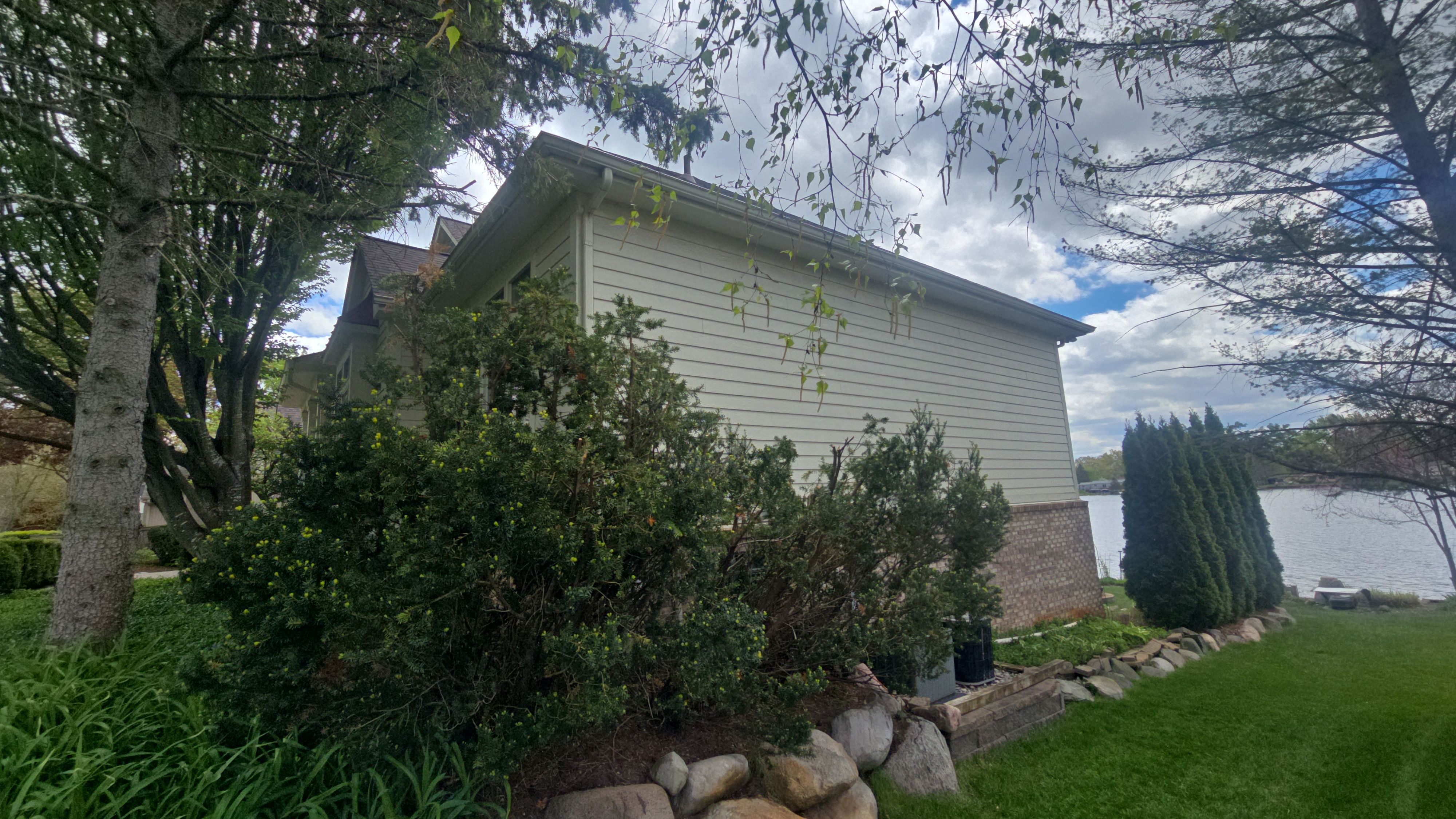 Exterior Wood Rot Repair and Trim Restoration in White Lake by Top Shelf Painter
