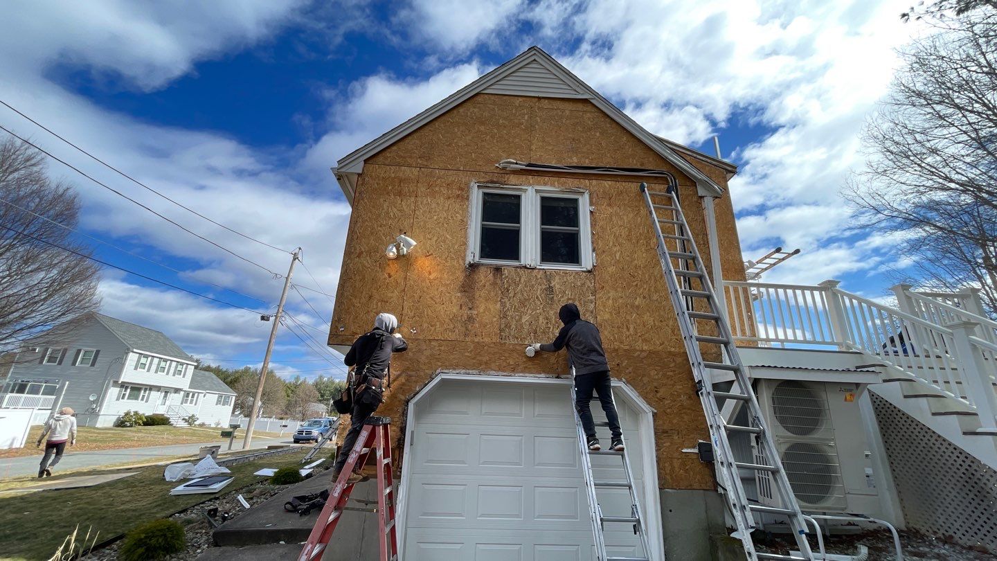 Complete Exterior Renovation with New Siding & Gutters   by Sensible Home Solutions