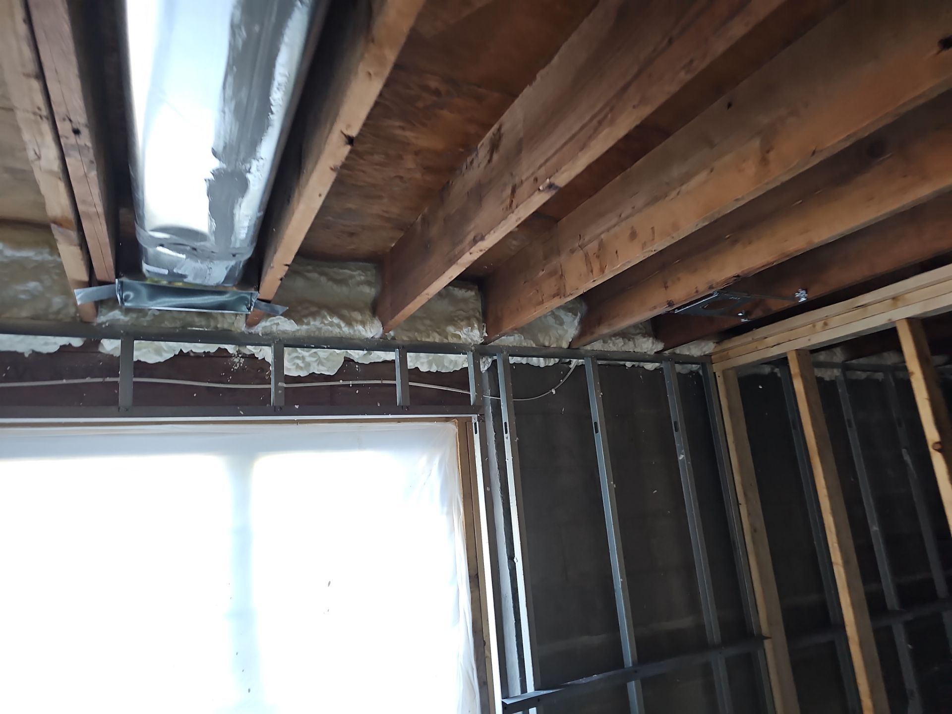 Basement Exterior Walls using Closed Cell Spray Foam by NYS Foam & Energy
