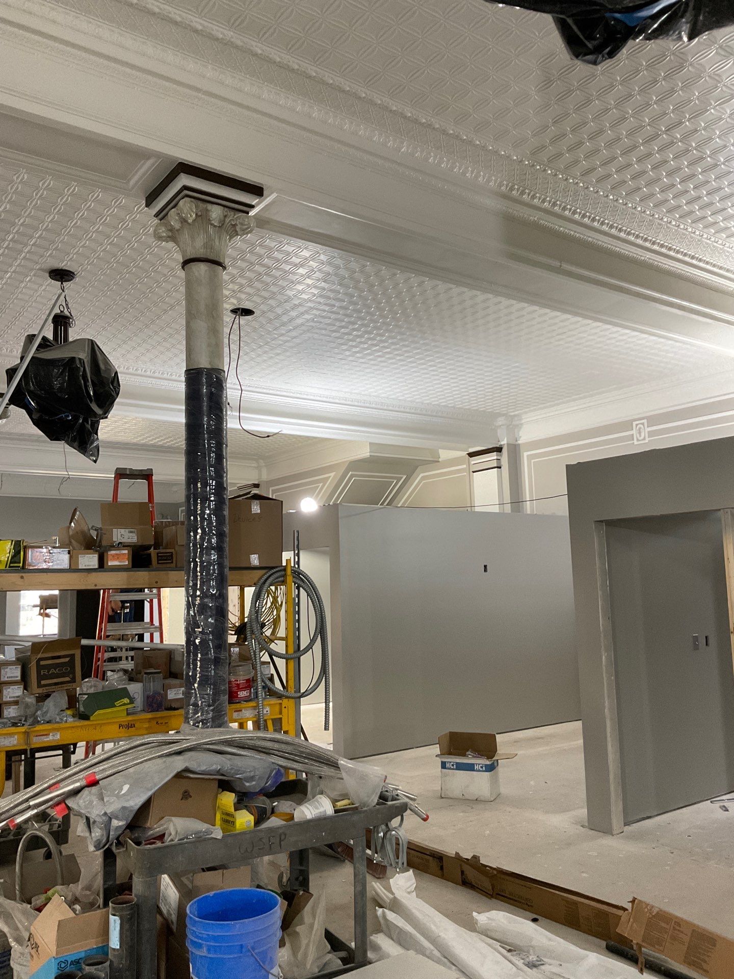 Commercial Interior Remodel for Dacotah Bank Featuring Decorative Tin Ceilings by Select Painting, Coatings & Garage Cabinets