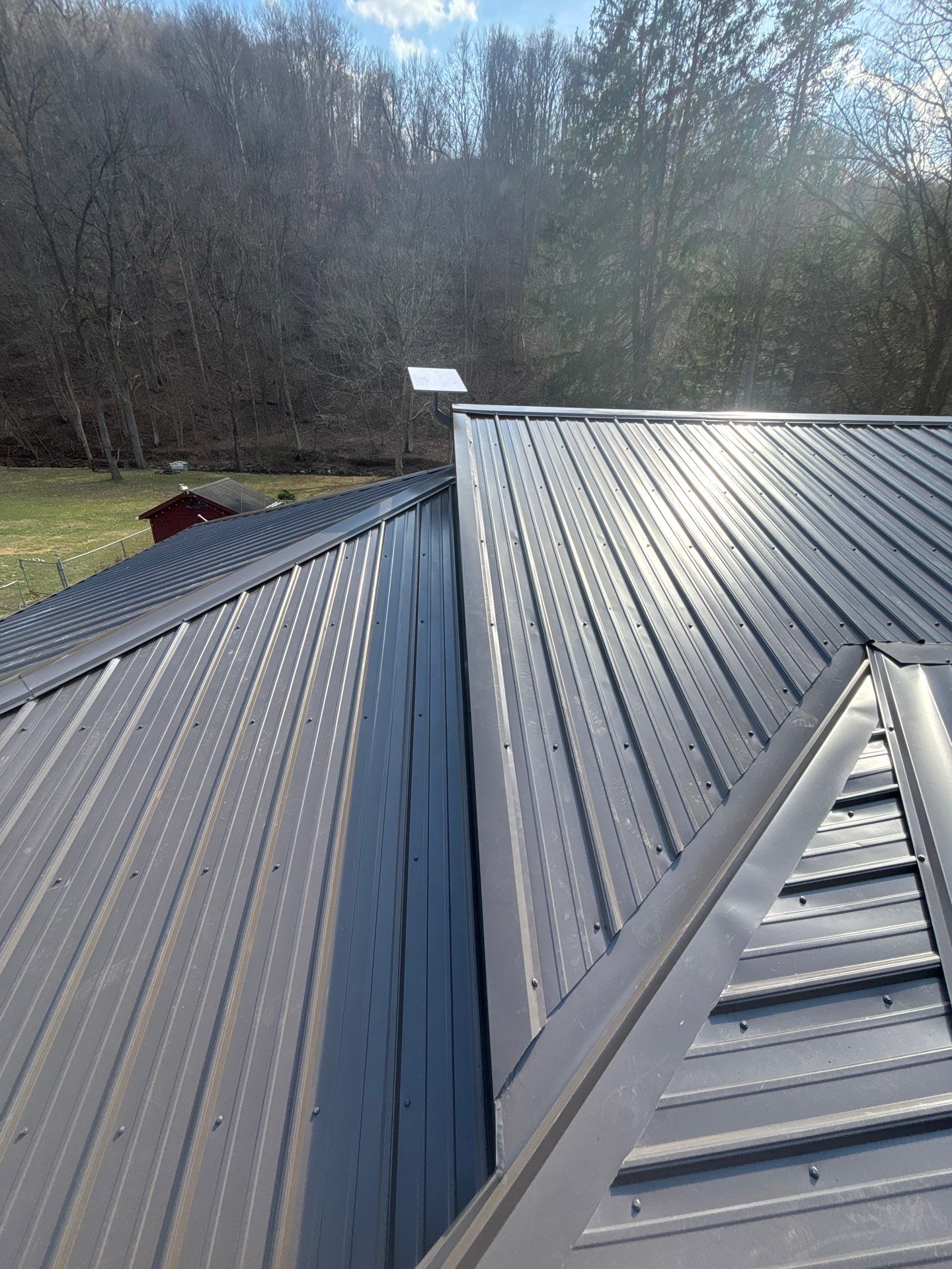 Residential Roofing Installation using Metal by Rainstoppers Roofing